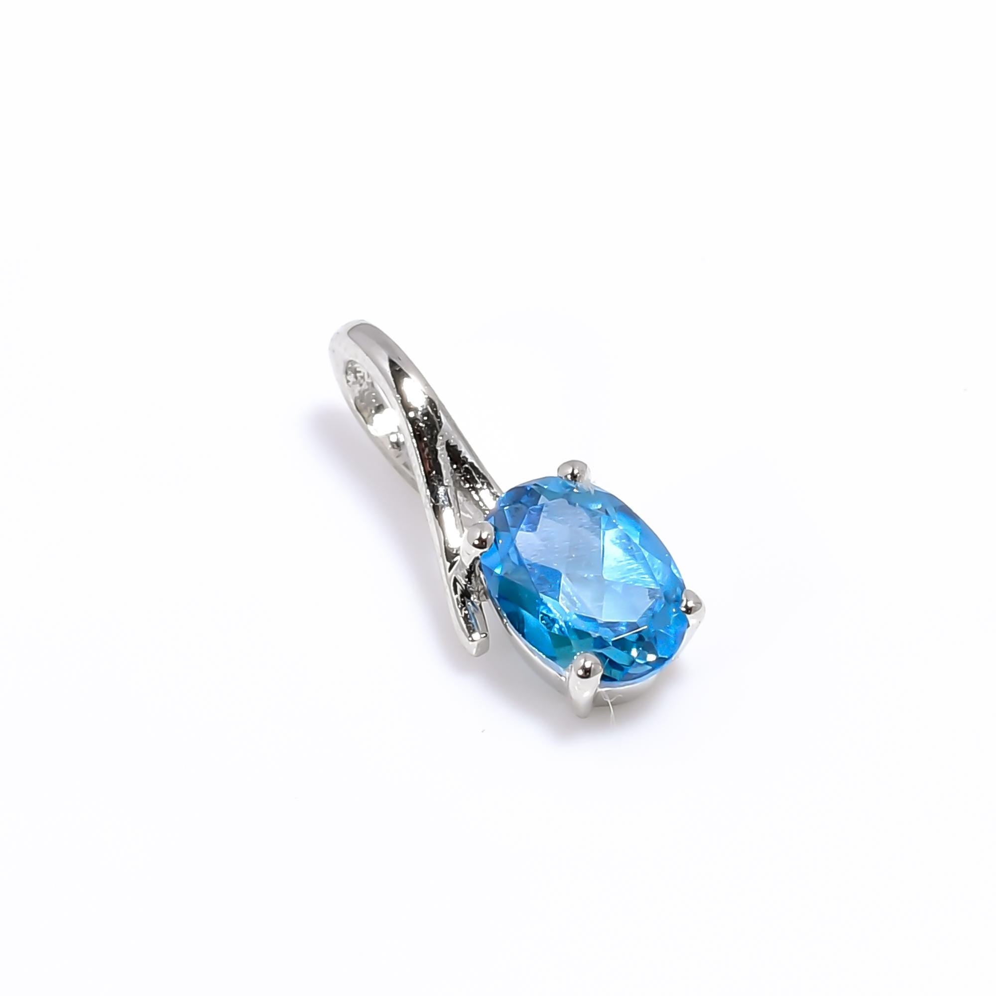 Swiss Blue Topaz Pendant Necklace: Oval Sterling Silver Birthstone
