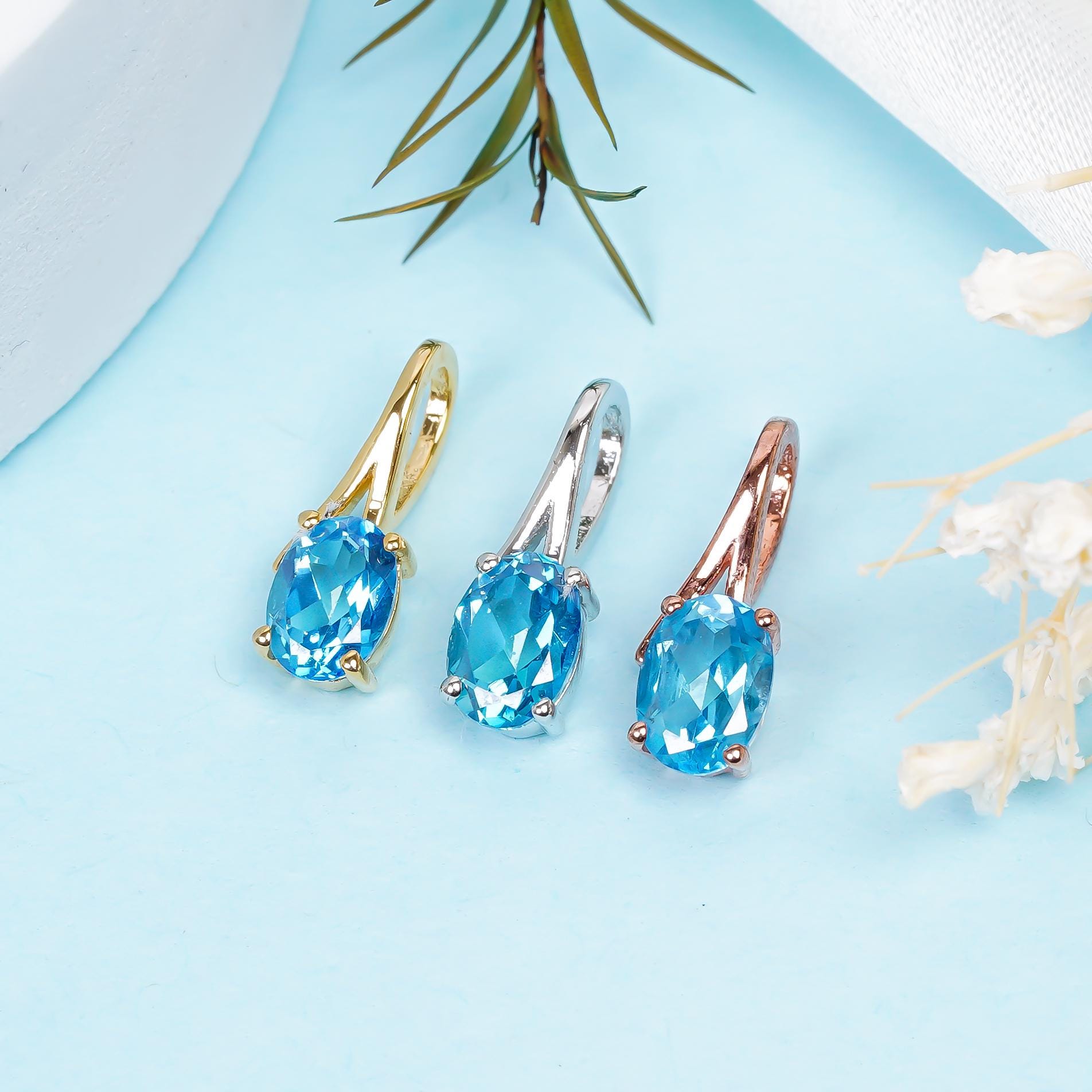 Swiss Blue Topaz Pendant Necklace: Oval Sterling Silver Birthstone