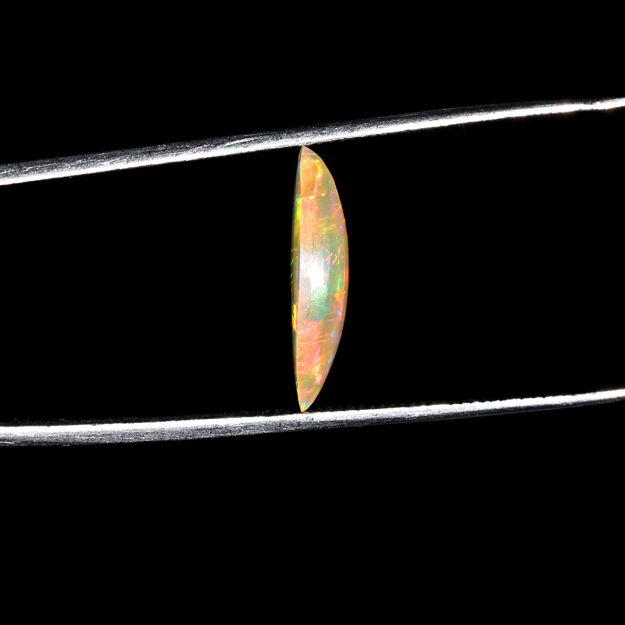 Milky White Ethiopian Opal Gemstone: 1.60 Carat Marquise Cabochon