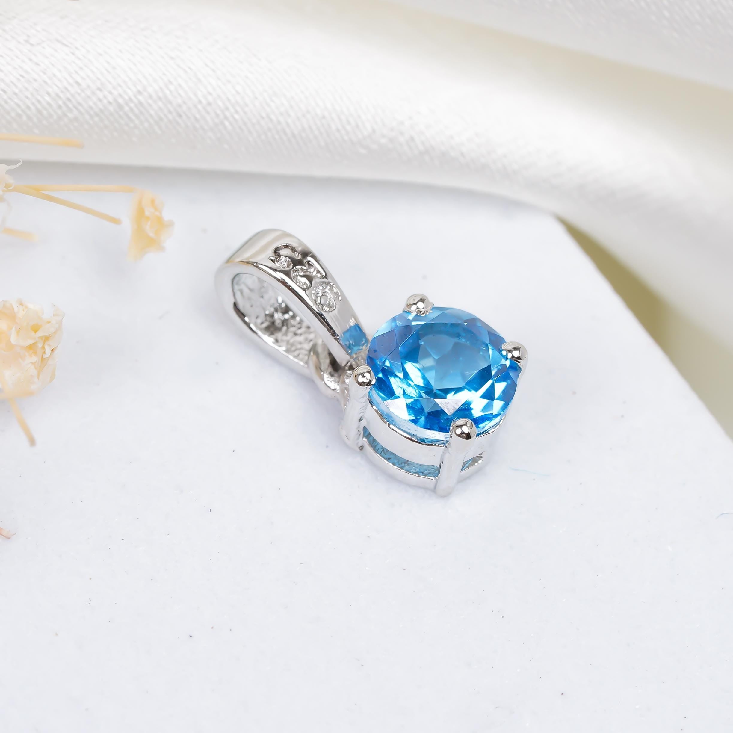 Faceted Swiss Blue Topaz Pendant: Handmade Sterling Silver Necklace