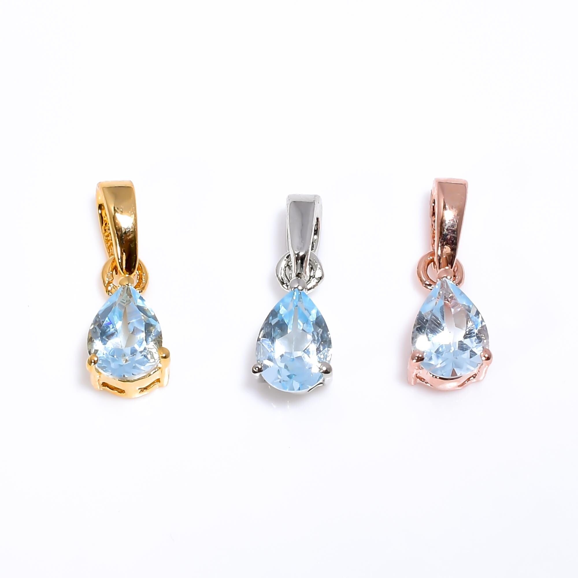 Handmade Sky Blue Topaz Pendant: 925 Sterling Silver Teardrop (5x7mm)