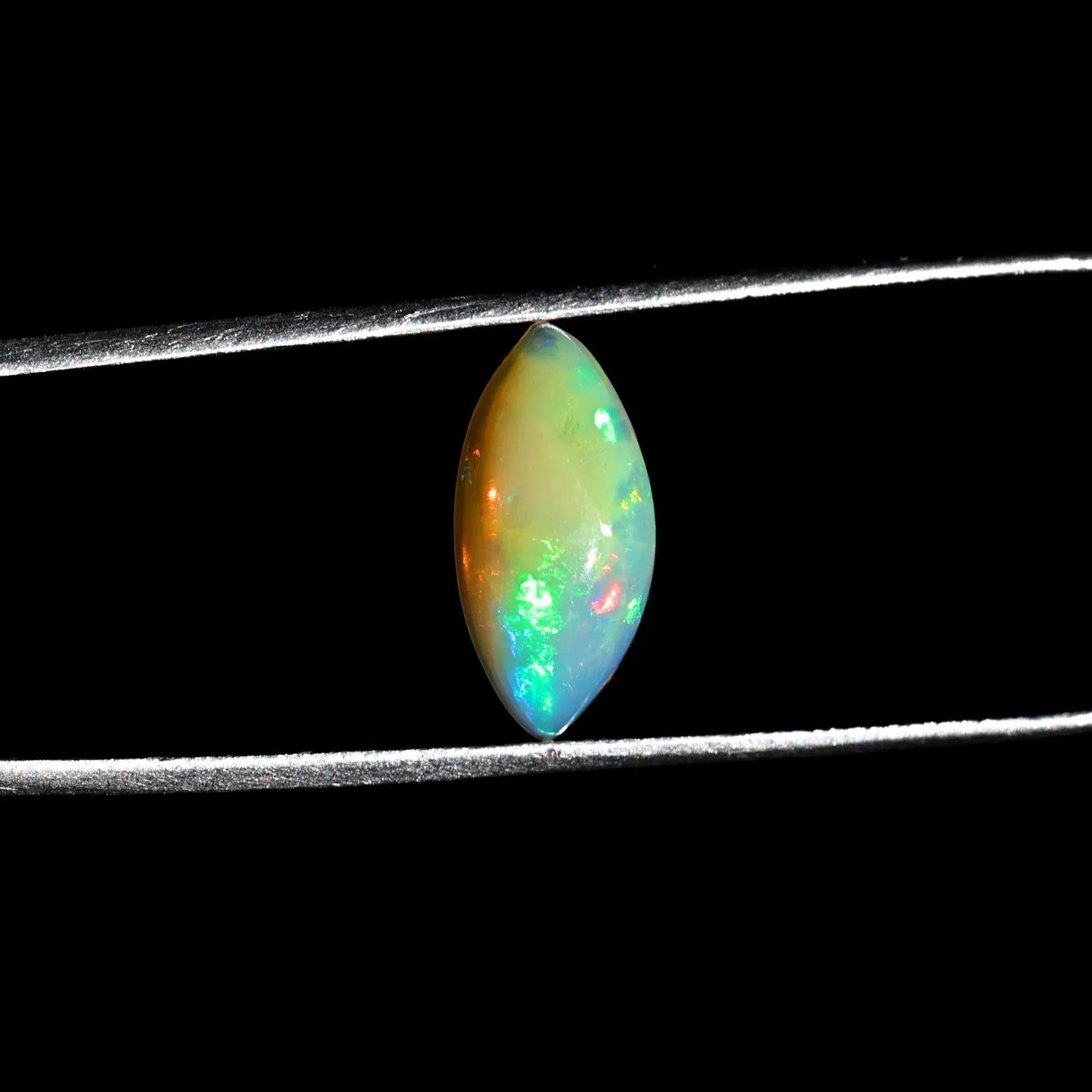 Ethiopian White Opal Cabochon: 1.85 Carat Marquise Fire Opal loose gemstones