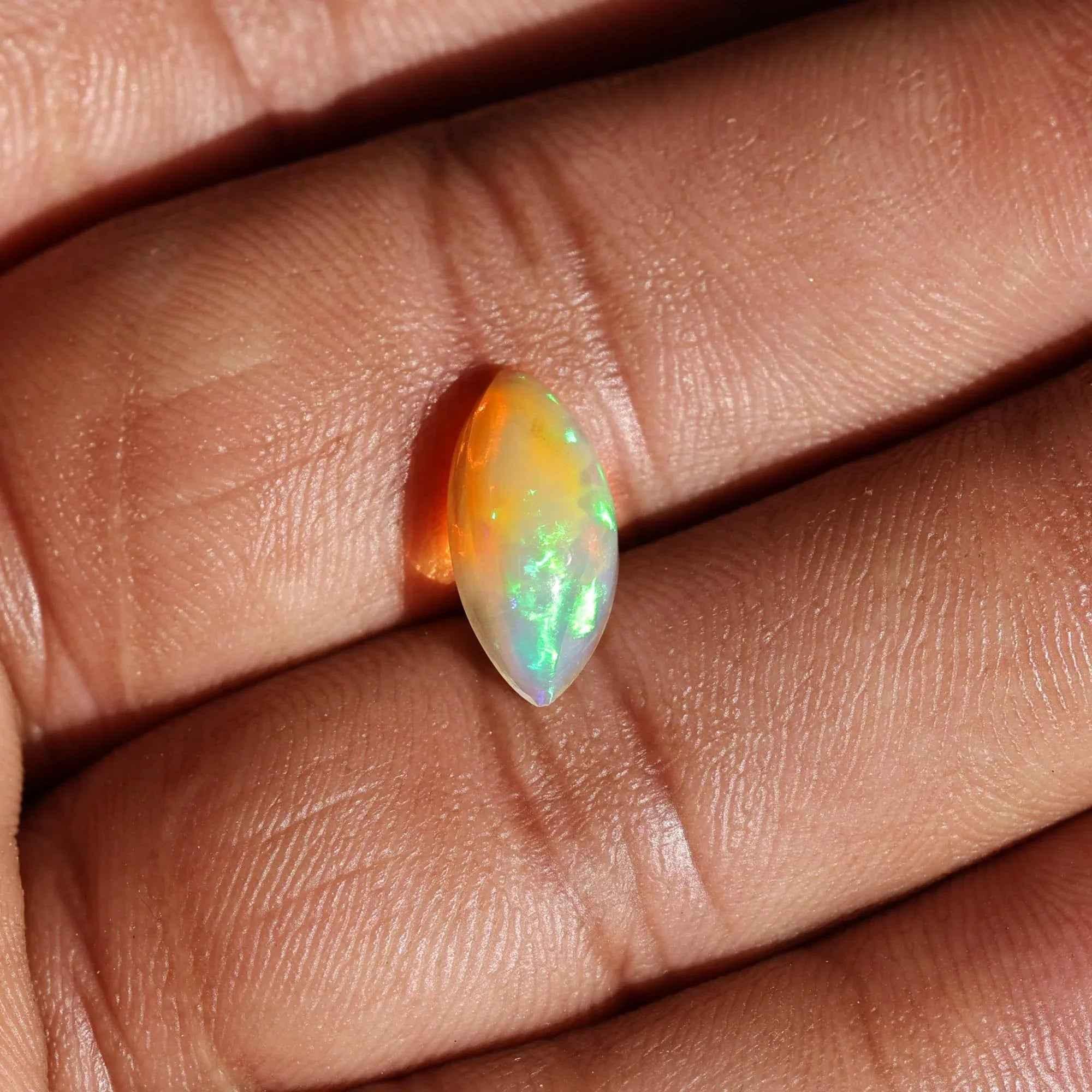 Ethiopian White Opal Cabochon: 1.85 Carat Marquise Fire Opal loose gemstones