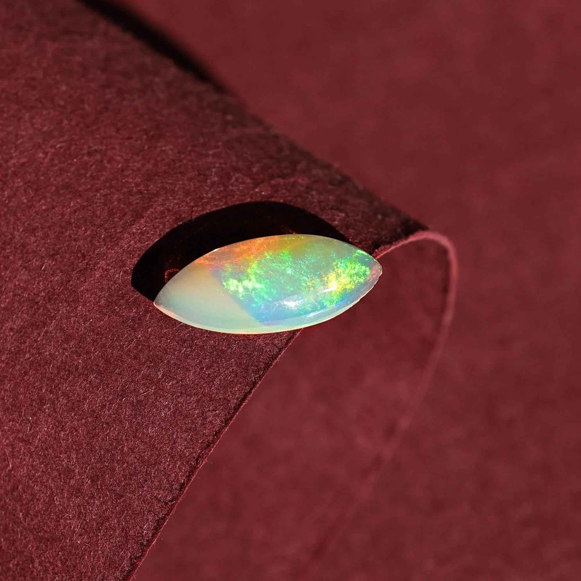 Ethiopian Opal Cabochon: White Marquise Fire Opal (1.35 Carat, 7x15mm) loose gemstones