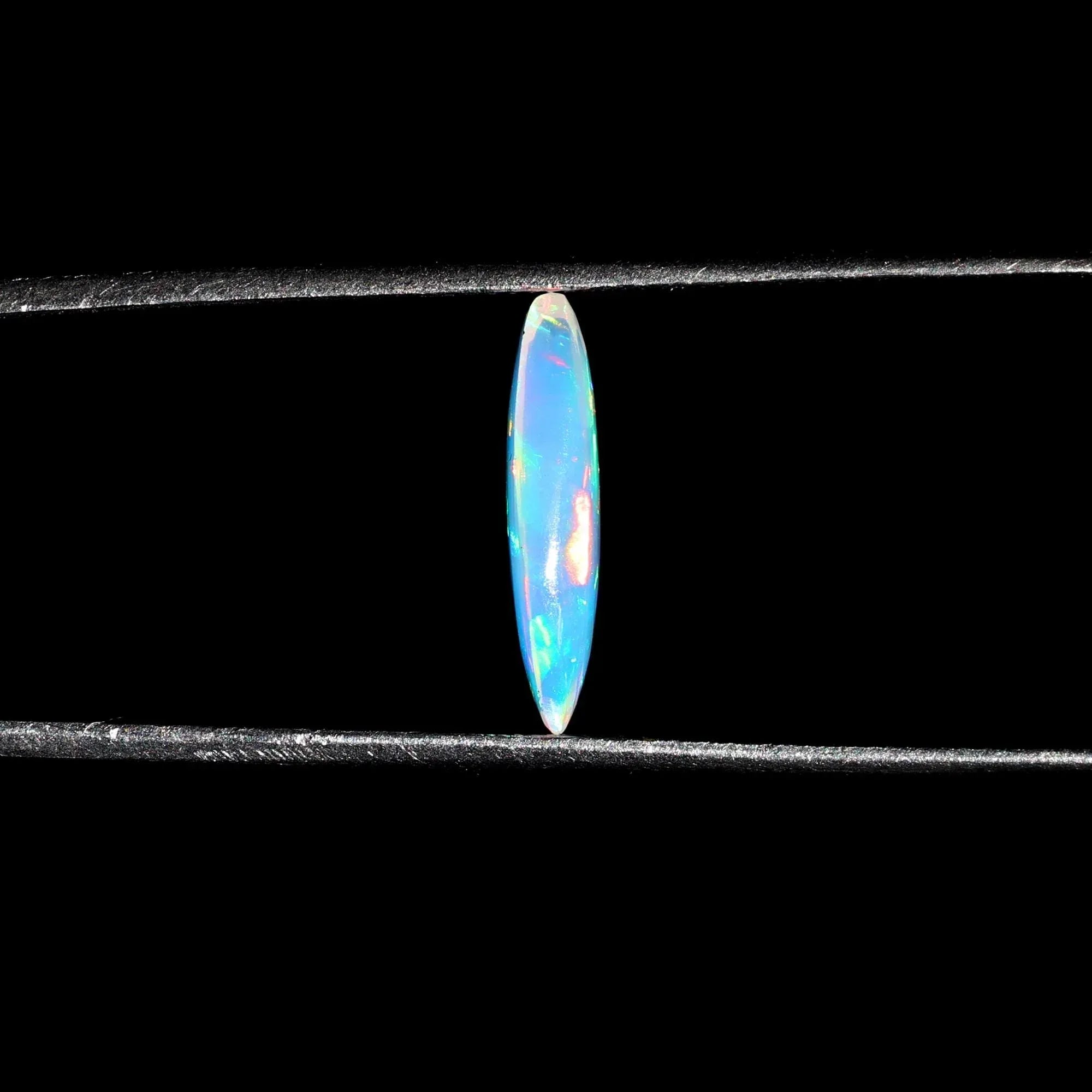 Ethiopian Opal Cabochon: Blue Fire Marquise Gemstone, 1.32 Carat loose gemstones