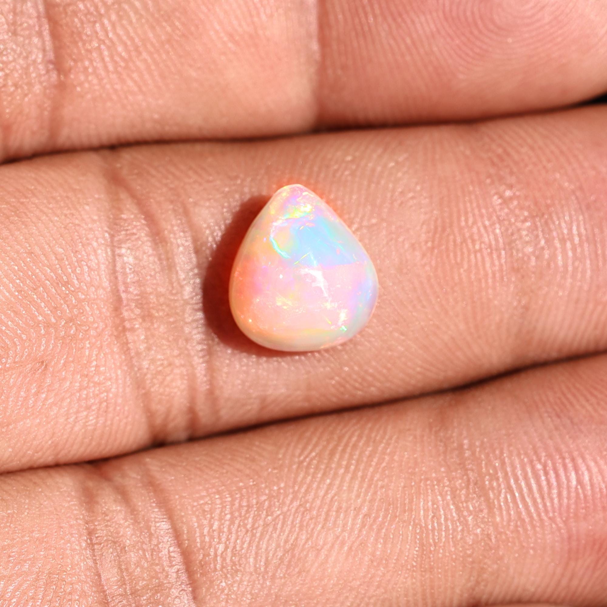 Natural AAA+ Grade White Ethiopian Opal Rainbow Fire Gemstones Opal Wholesale 2.10 Carat