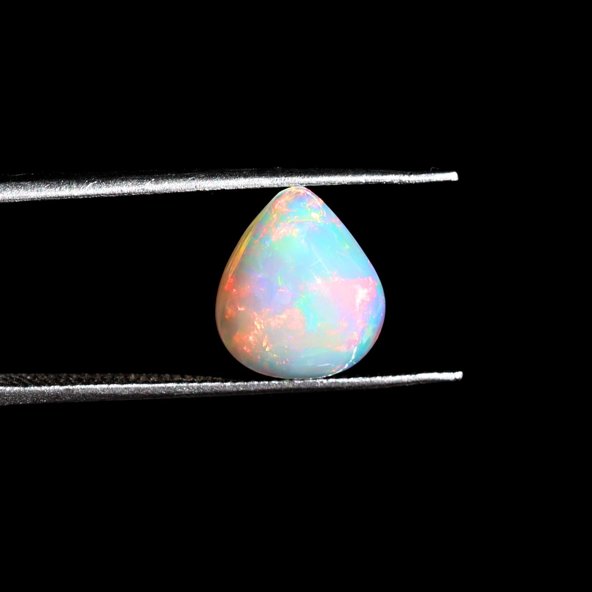 Natural AAA+ Grade White Ethiopian Opal Rainbow Fire Gemstones Opal Wholesale 2.10 Carat