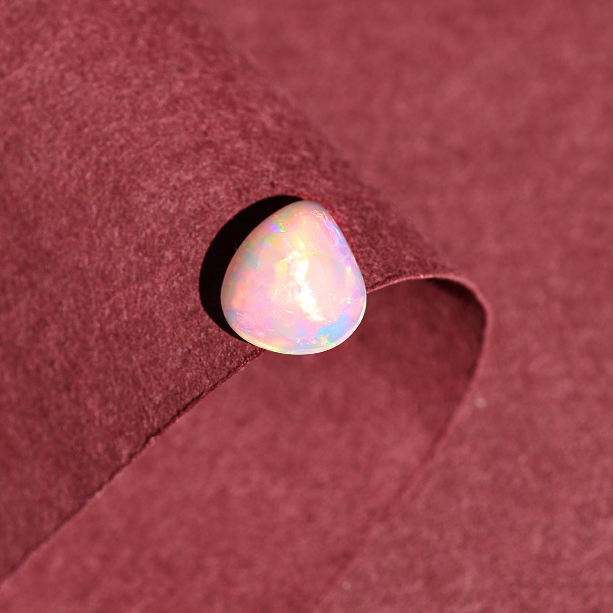 Natural AAA+ Grade White Ethiopian Opal Rainbow Fire Gemstones Opal Wholesale 2.10 Carat