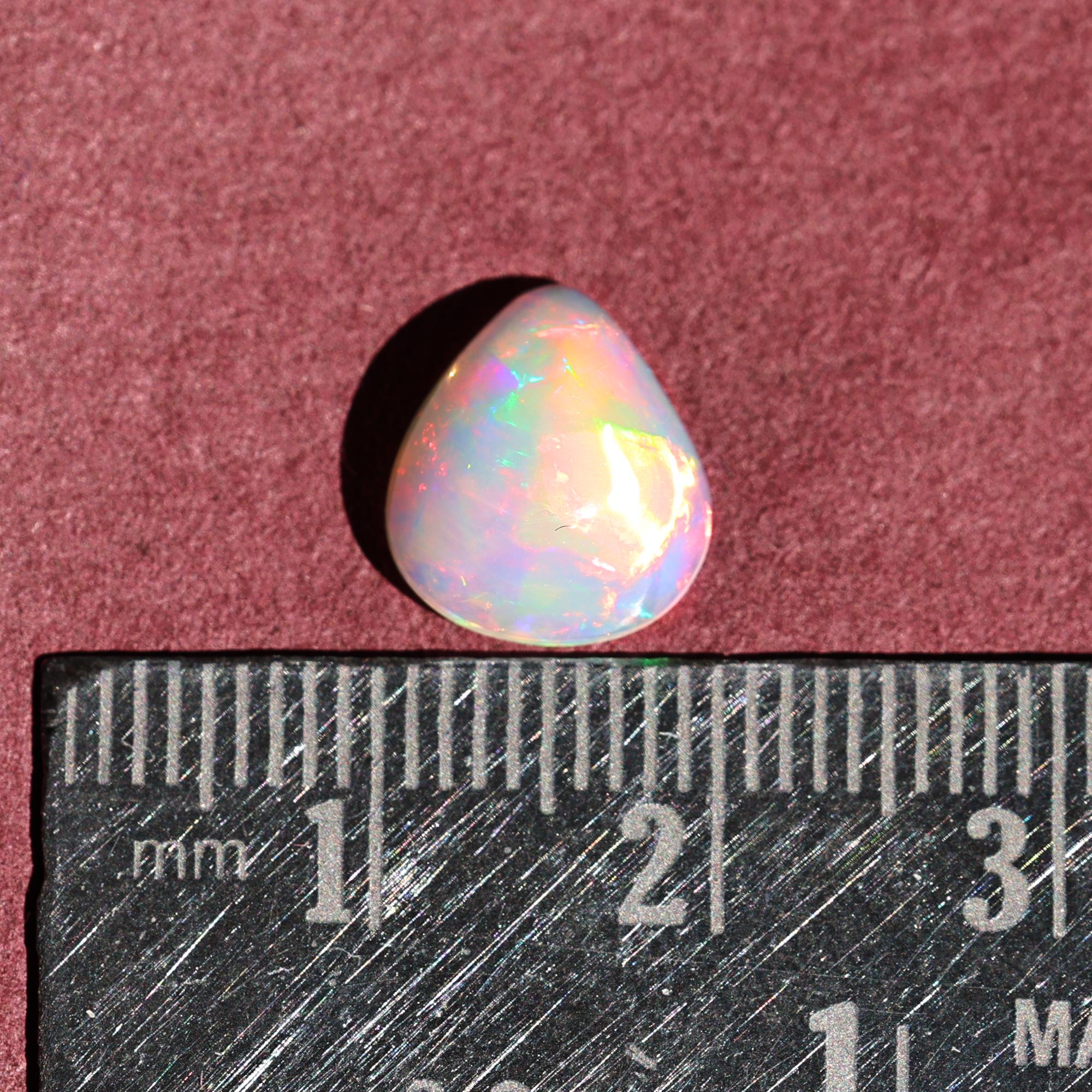 Natural AAA+ Grade White Ethiopian Opal Rainbow Fire Gemstones Opal Wholesale 2.10 Carat
