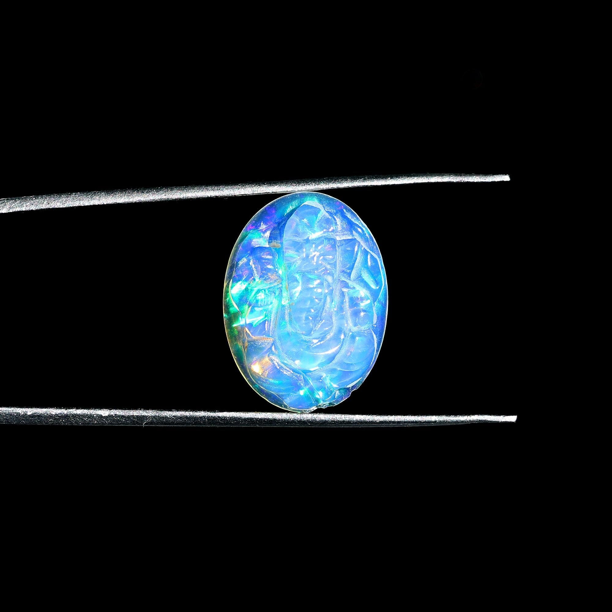 Welo Fire Opal Carving: Hand Carved Ganesha Pendant (3.90 Carat)