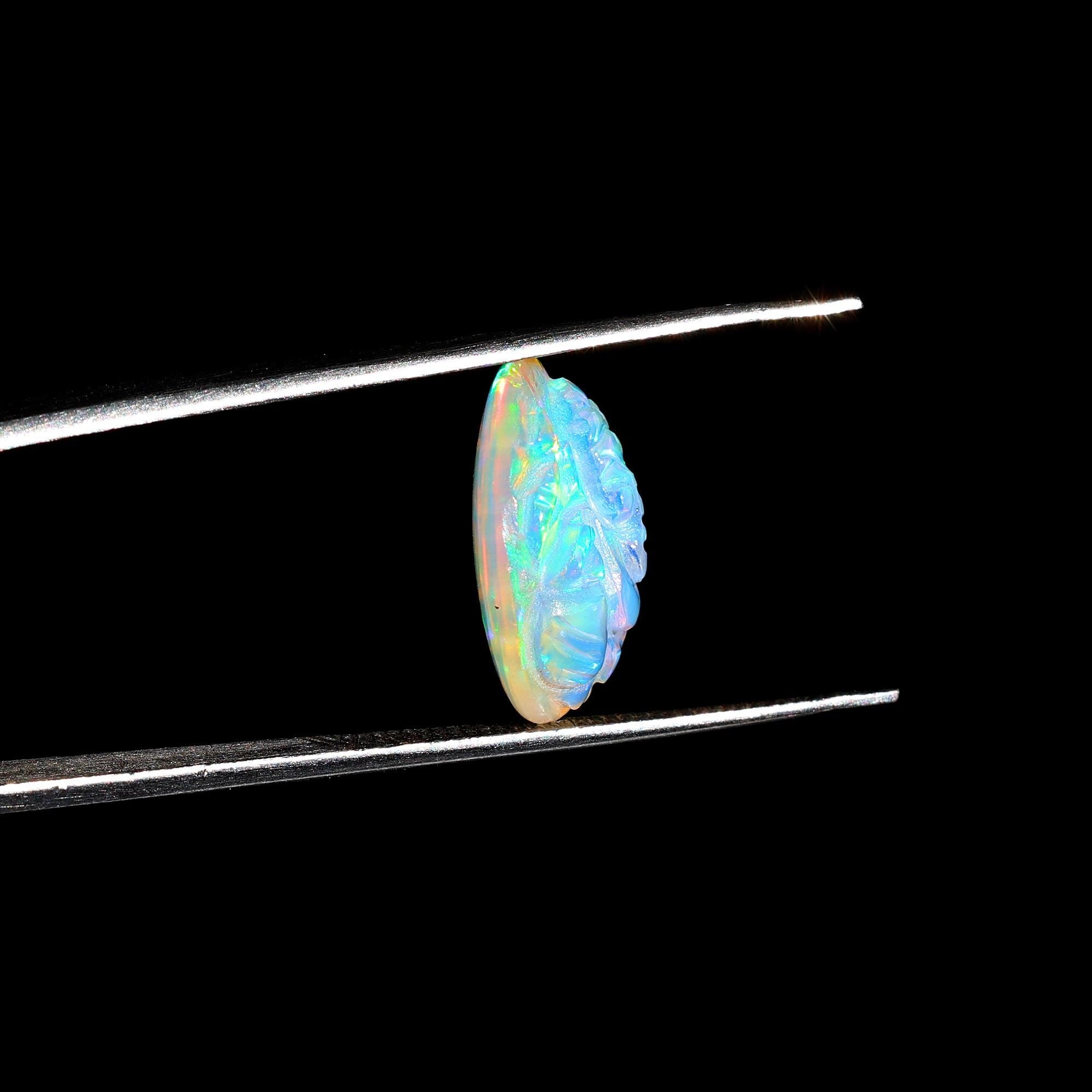 5.10 Carat Carved Ethiopian Opal Ganesha Gemstone (12x16mm)