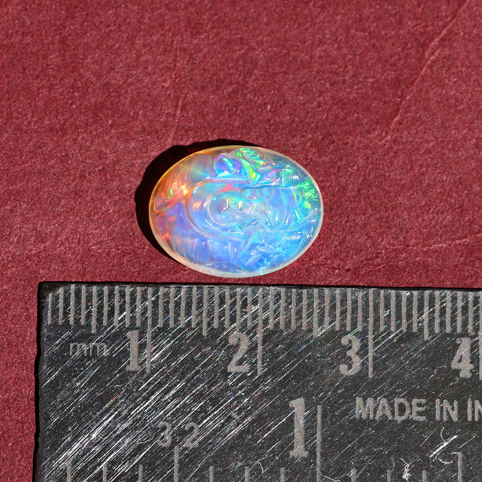5.10 Carat Carved Ethiopian Opal Ganesha Gemstone (12x16mm)