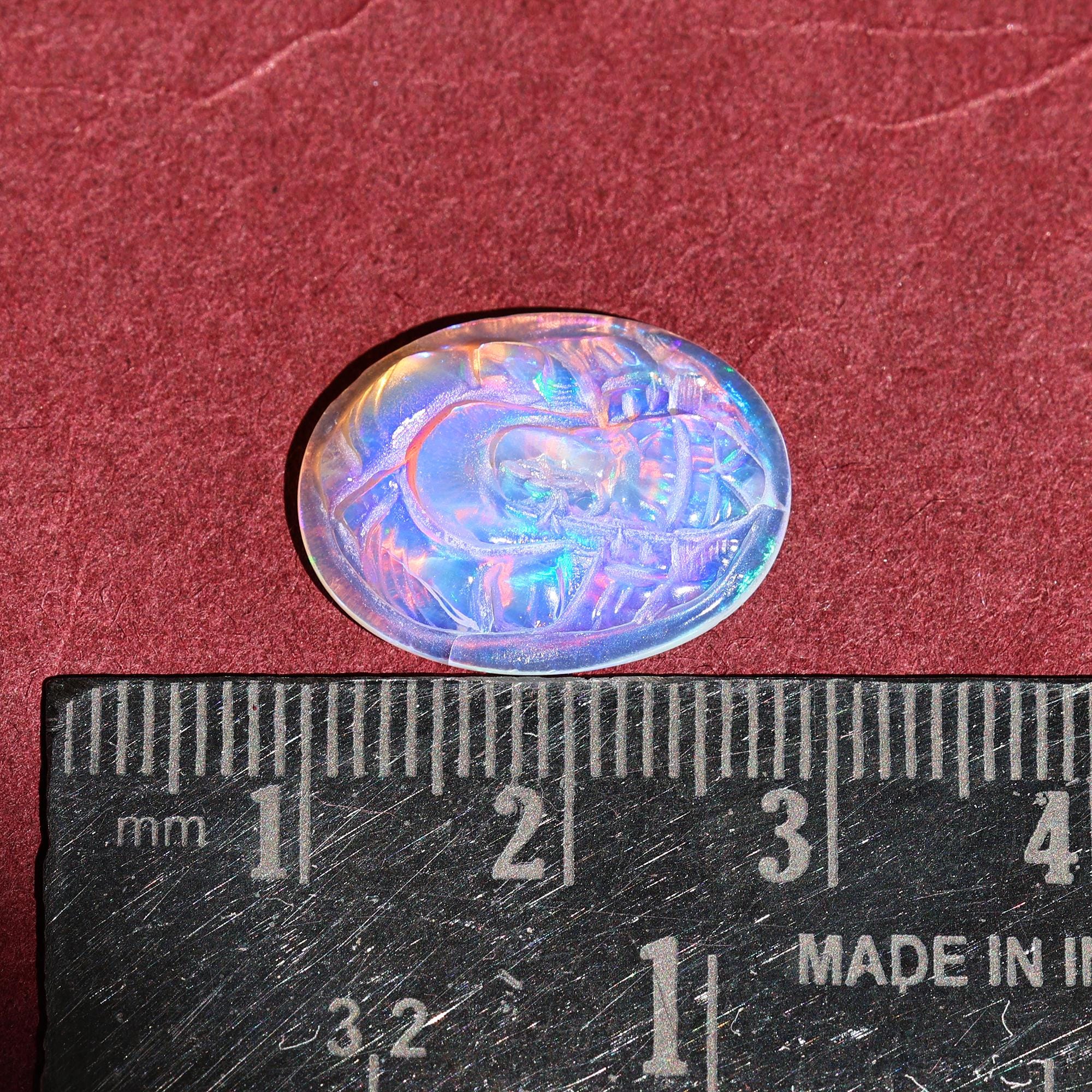 Carved Opal Ganesha Statue: 5.60 Carat Ethiopian Gemstone Carving