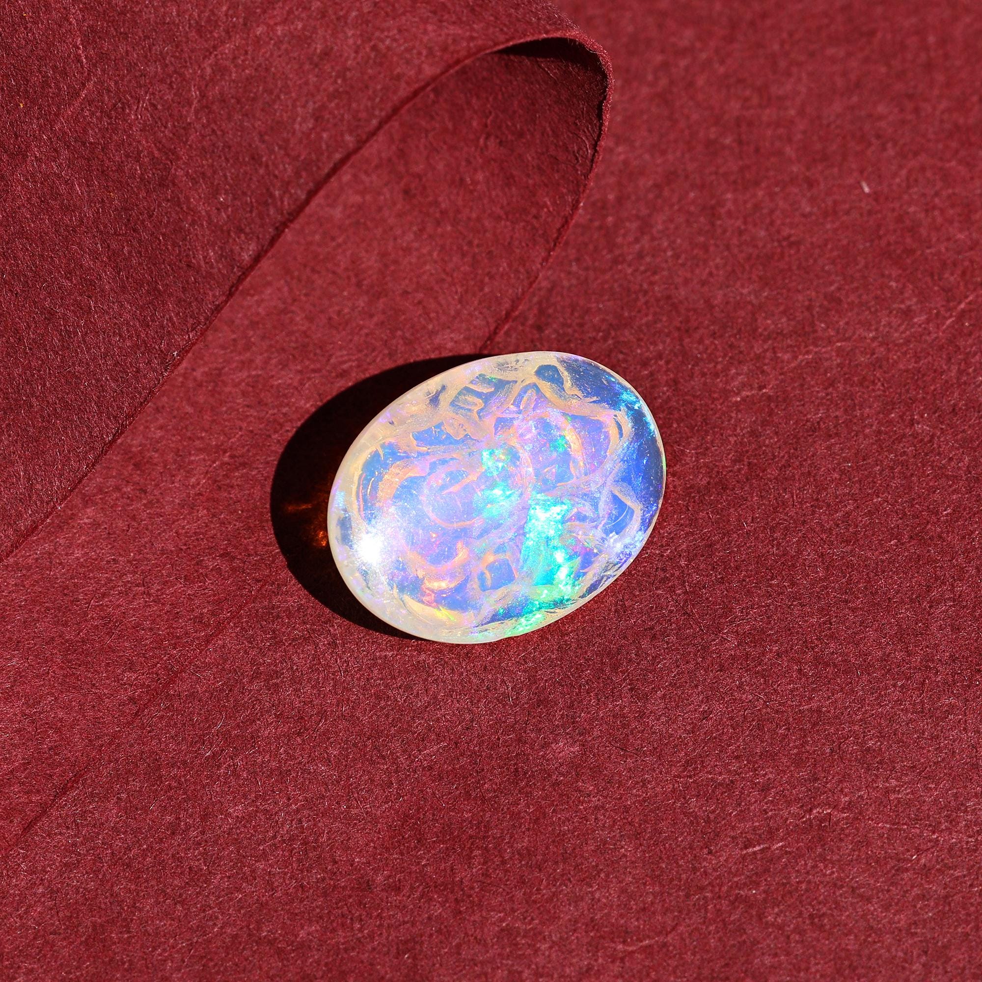 8.60 Carat Carved White Ethiopian Opal Ganesha Figurine