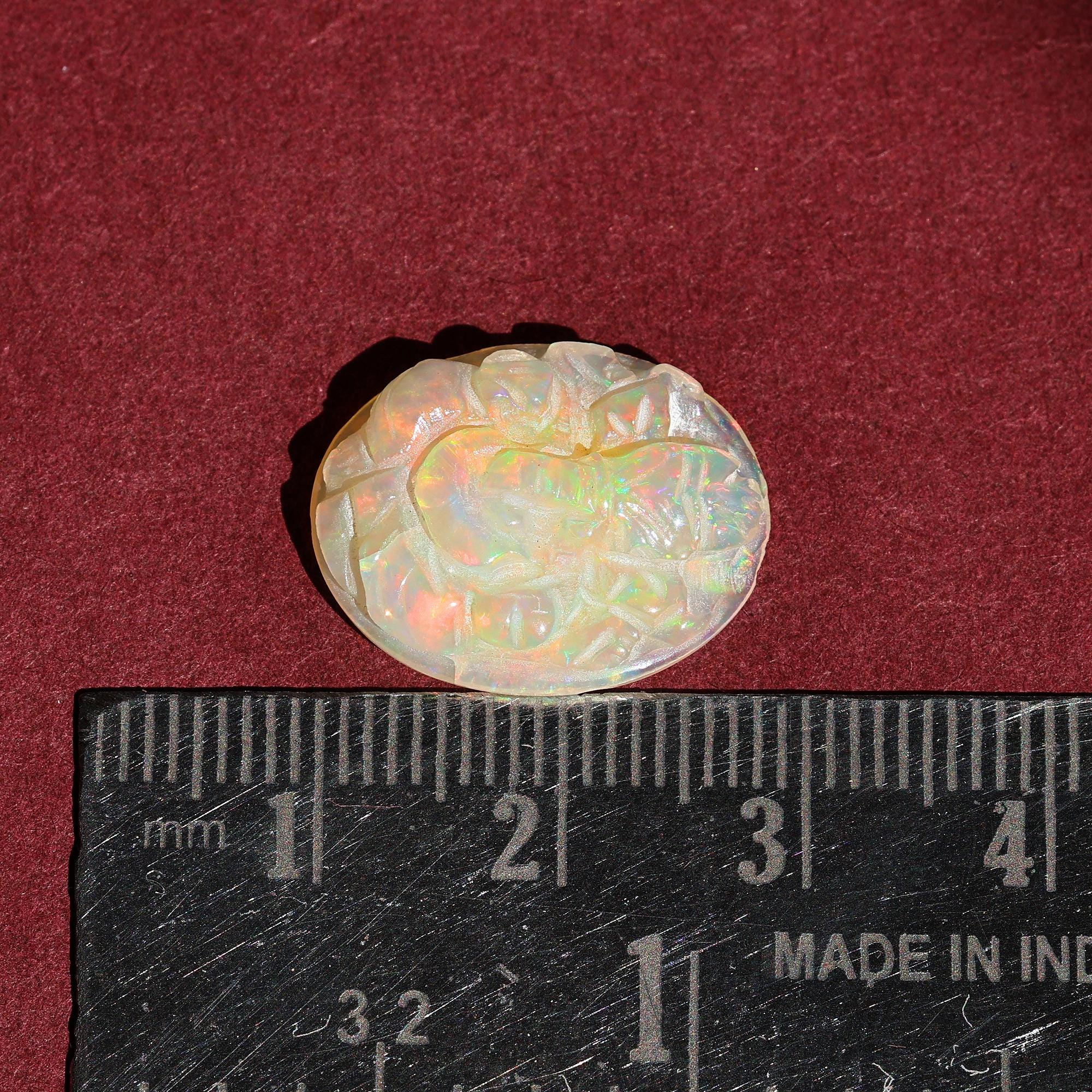 Hand-Carved Ethiopian Opal Ganesha Statue: Spiritual Home Decor (15x19mm, 7.50 Carat)