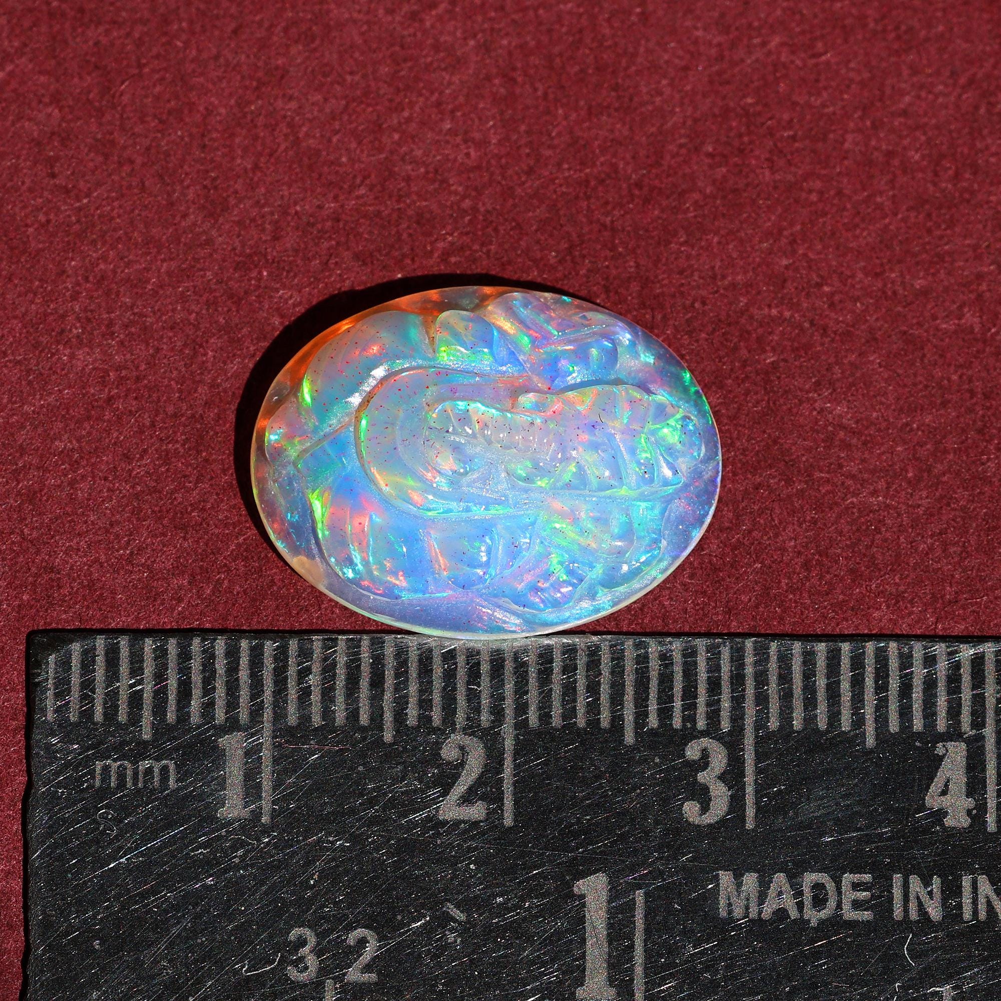 Welo Fire Opal Carving: Handmade Ganesha Gemstone (8 Carat)