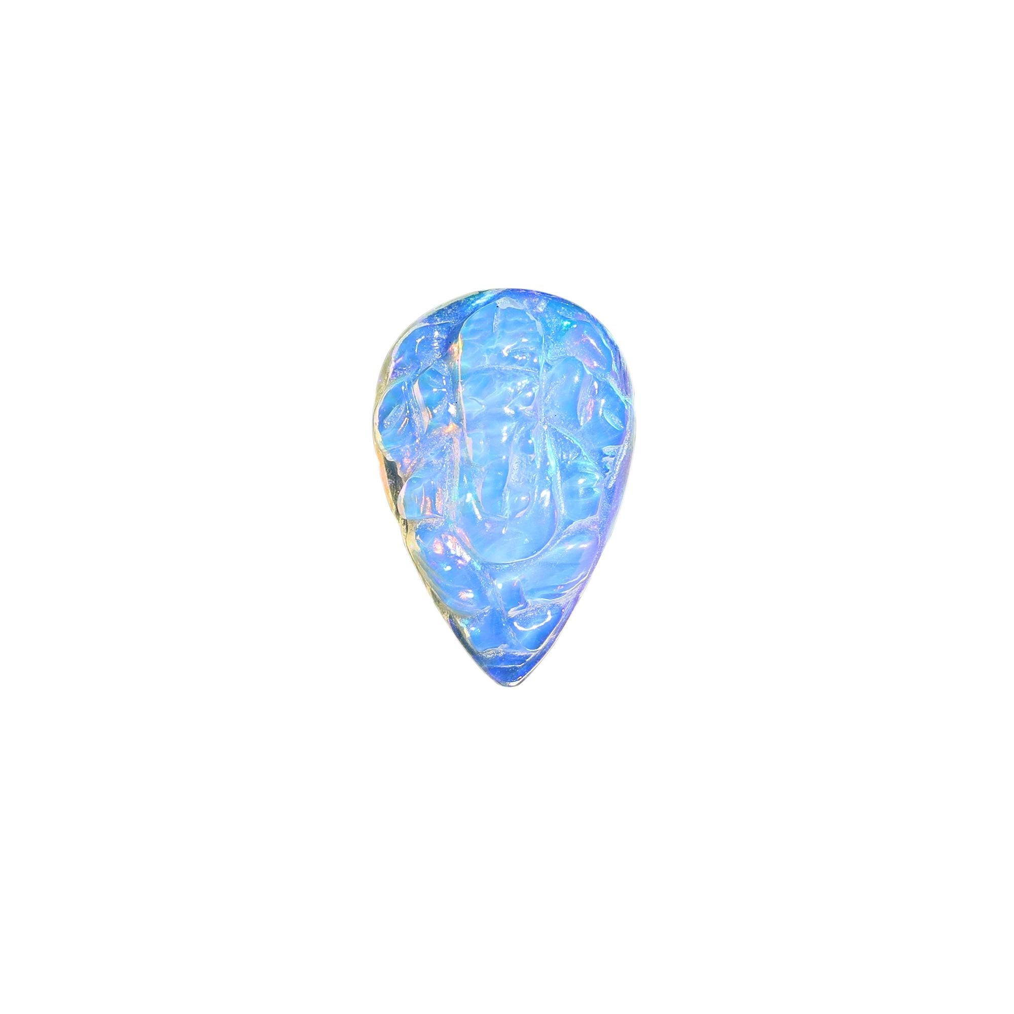 Carved Opal Ganesha: 4.70 Carat Pear-Shaped Gemstone