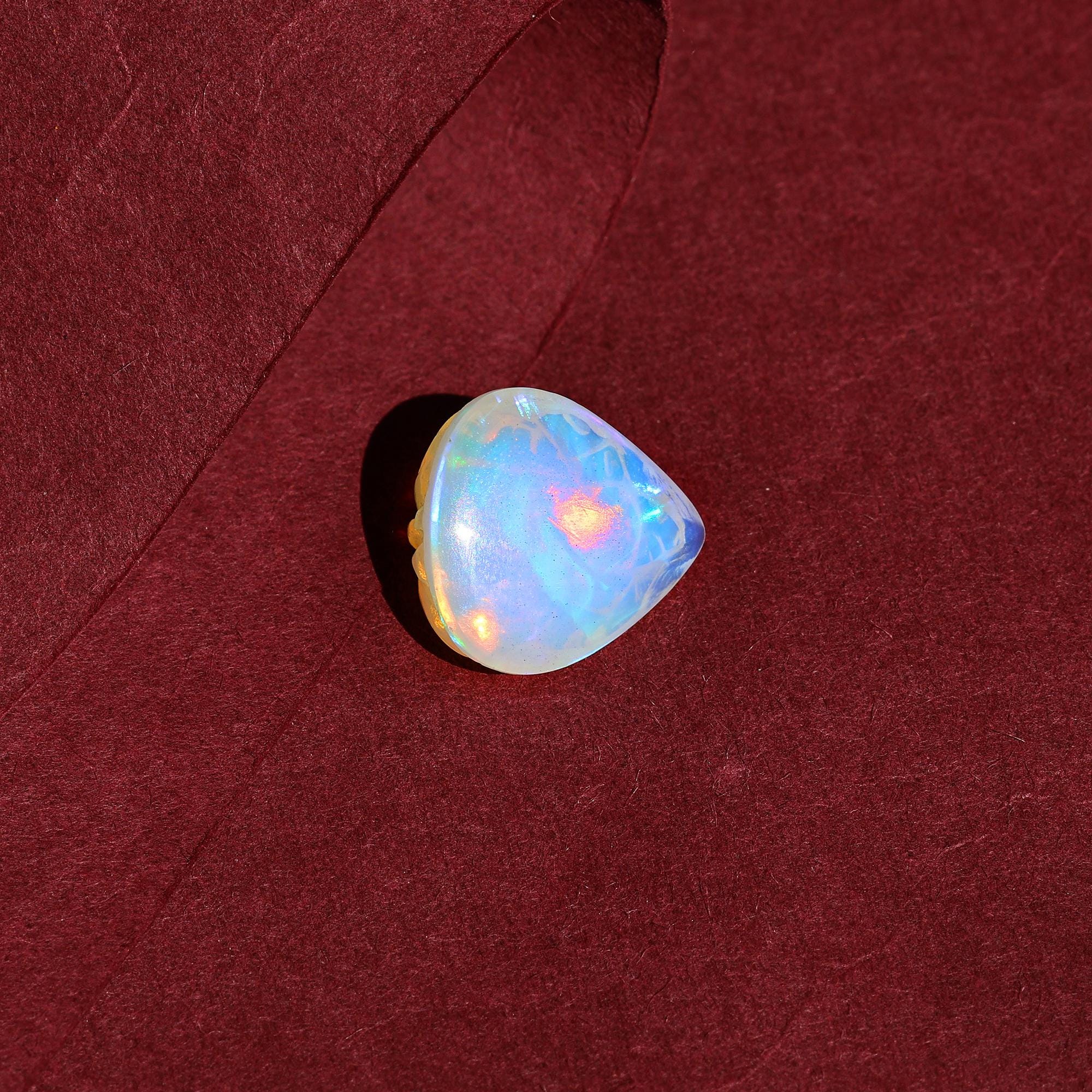 Ethiopian Opal Ganesha Idol: Heart Carving, Spiritual Hindu Figurine