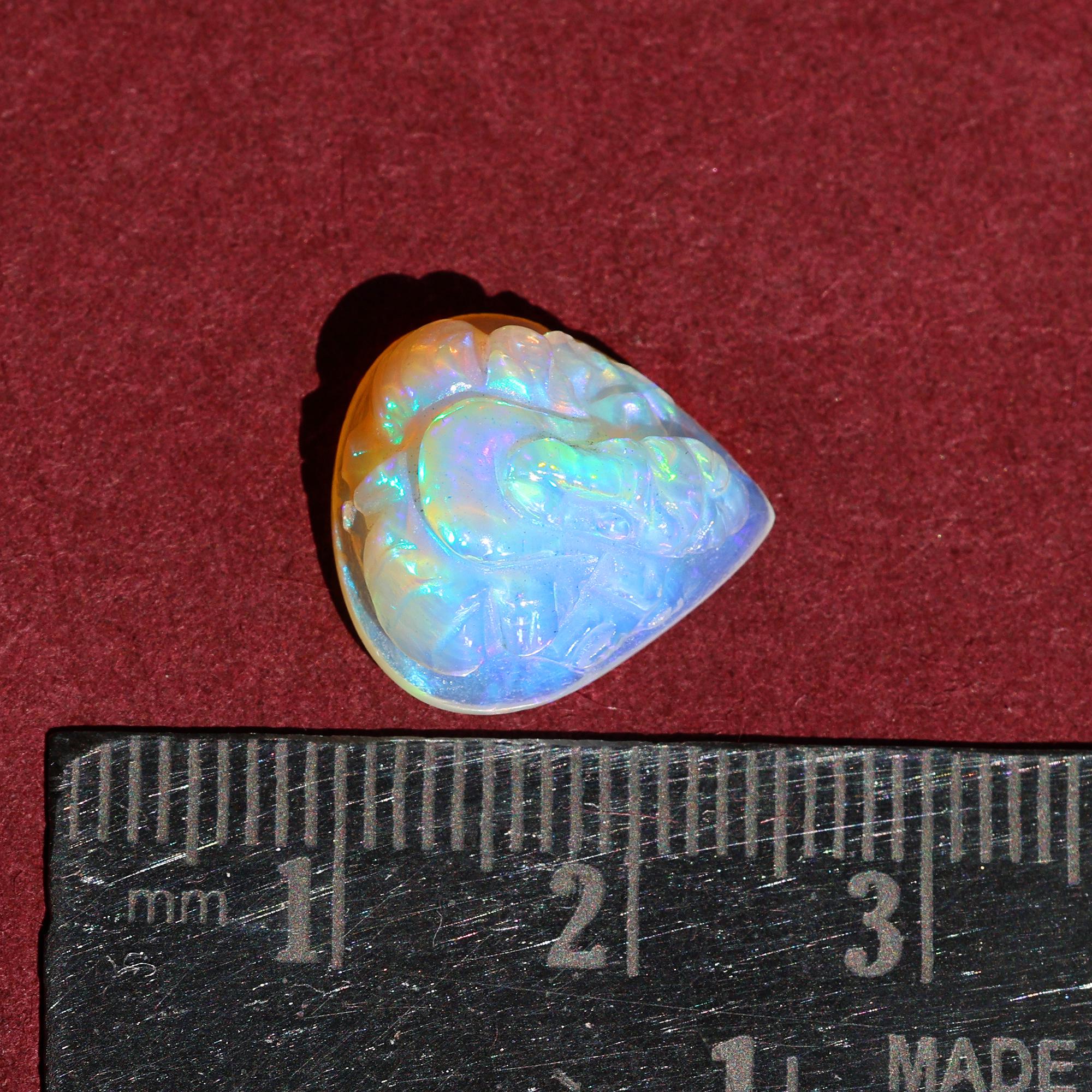 Ethiopian Opal Ganesha Idol: Heart Carving, Spiritual Hindu Figurine