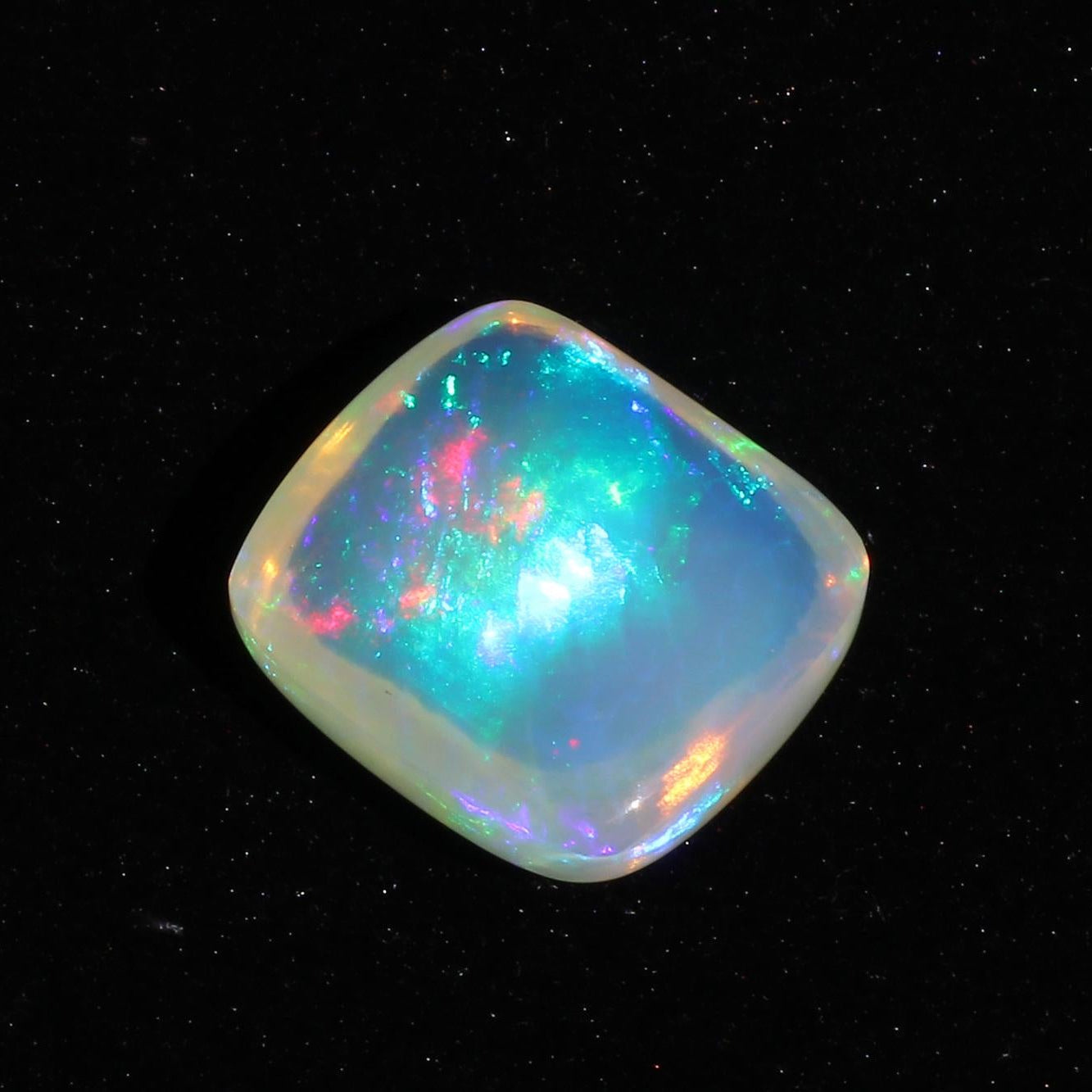 Welo Opal Cabochon: 19.10 ct Ethiopian White Fire Gemstone