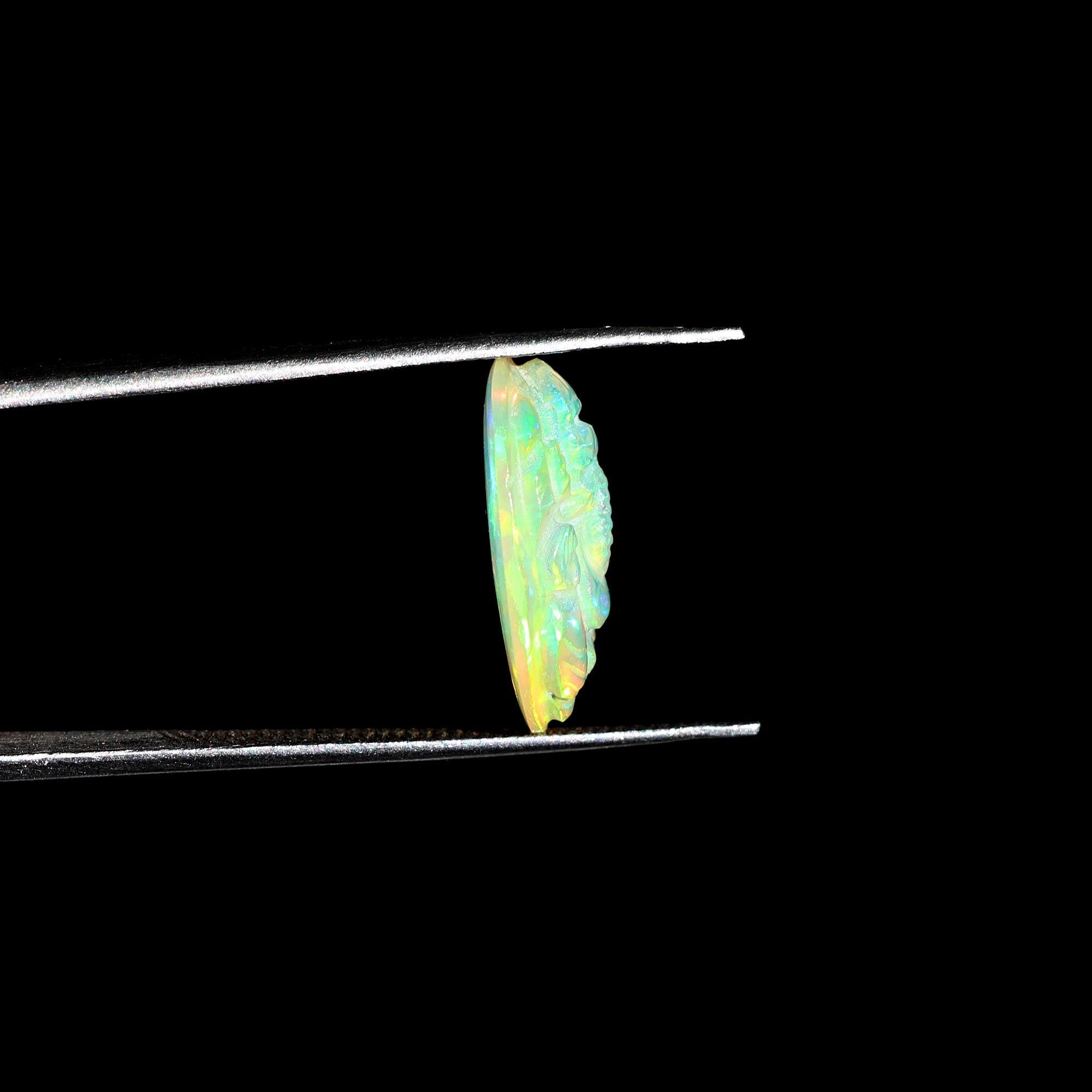 Ethiopian Opal Ganesha Carving: Oval Gemstone Statue (10x16mm)