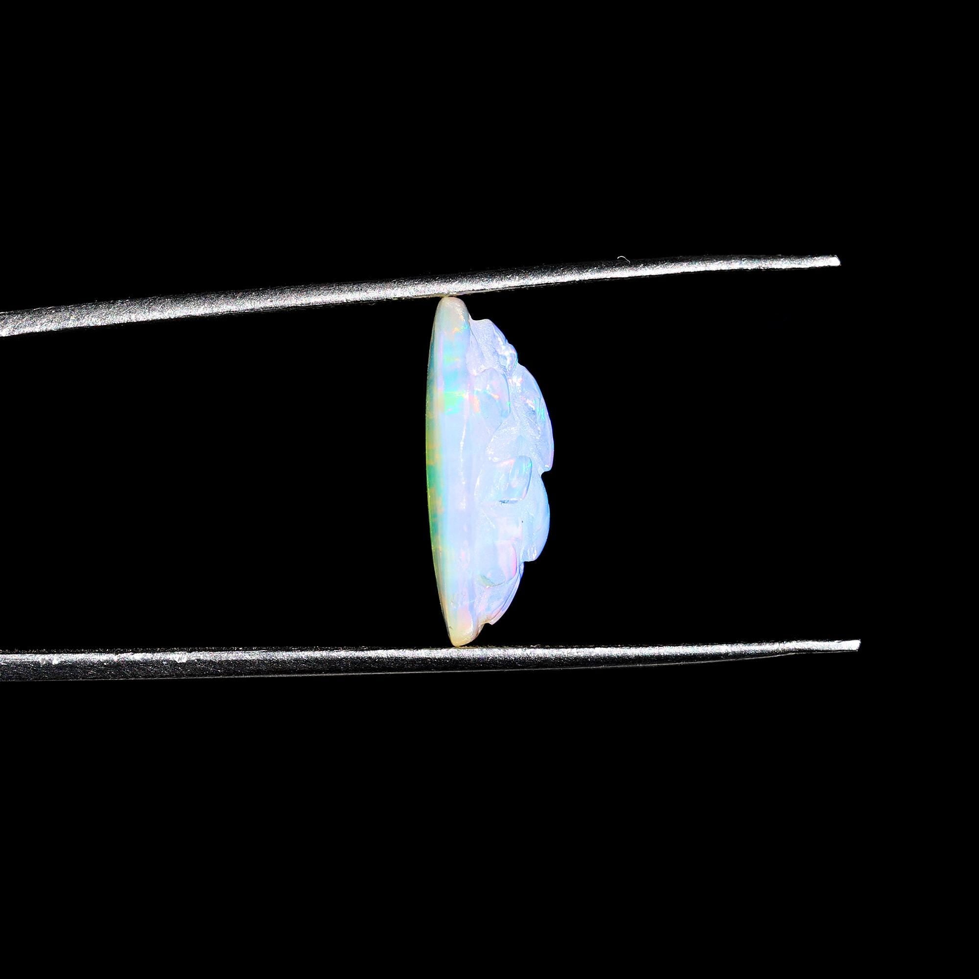 Ethiopian Opal Ganesha Carving: Divine Gemstone (12x16mm)