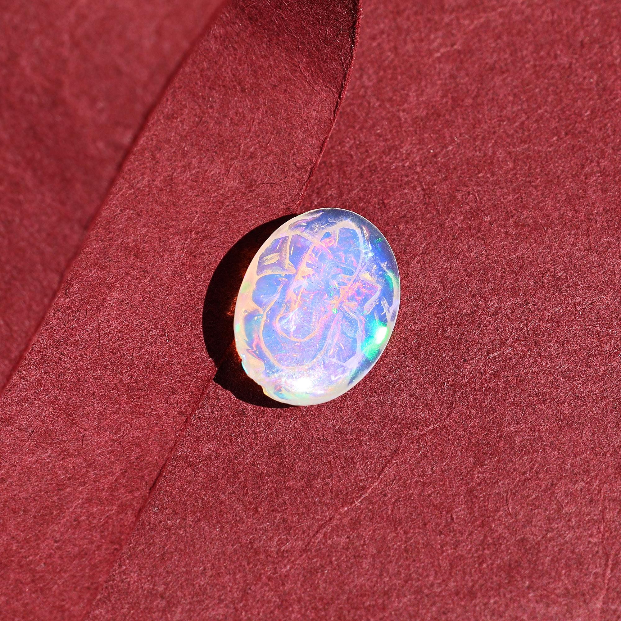 Welo Fire Opal Carving: Hand Carved Ganesha Pendant (3.90 Carat)