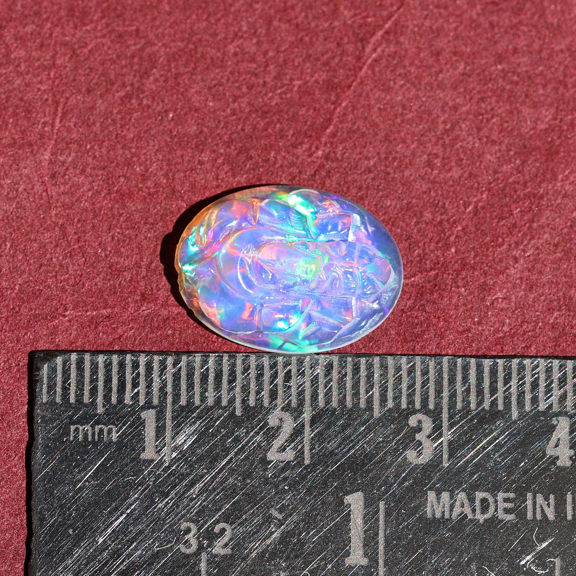 Welo Fire Opal Carving: Hand Carved Ganesha Pendant (3.90 Carat)