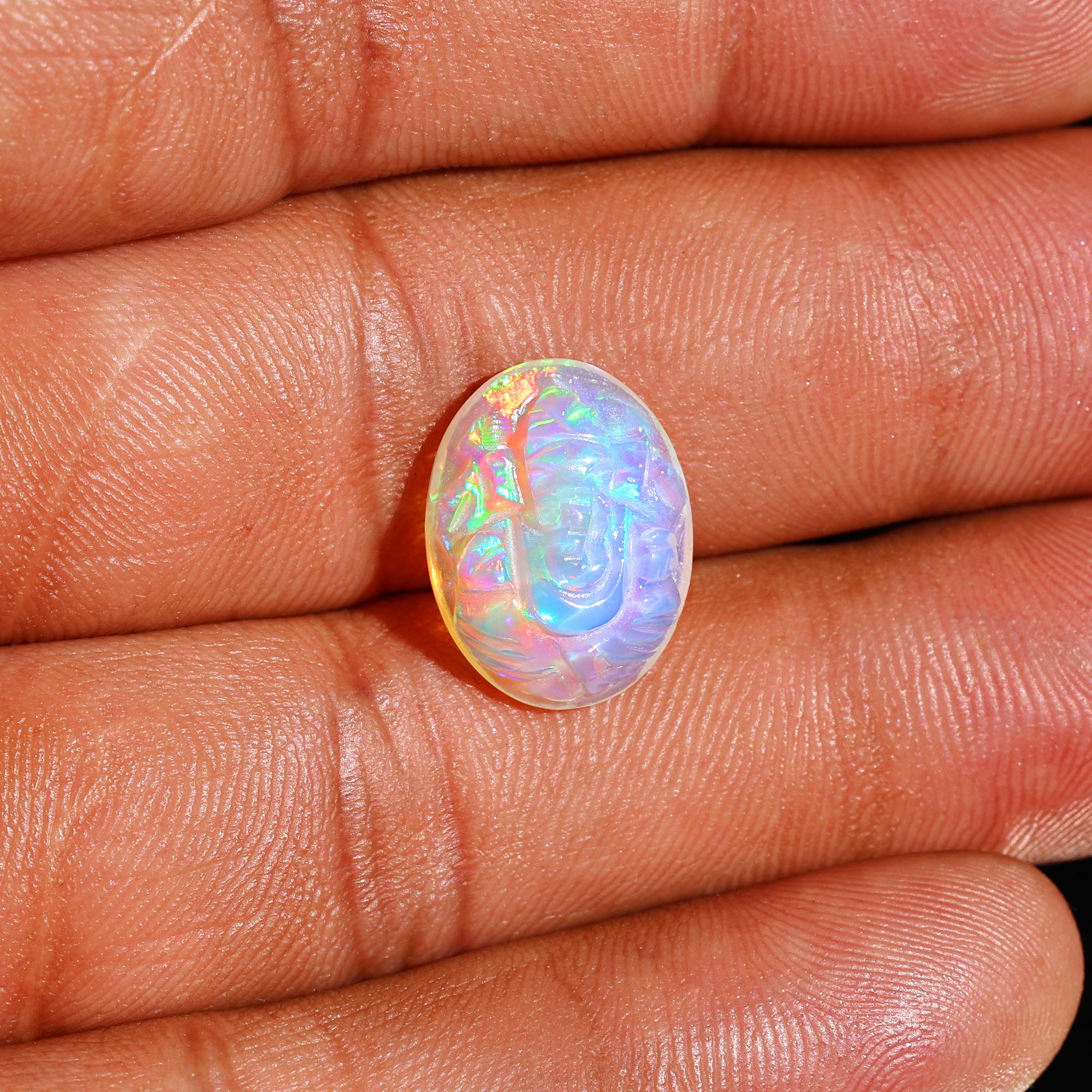 5.10 Carat Carved Ethiopian Opal Ganesha Gemstone (12x16mm)