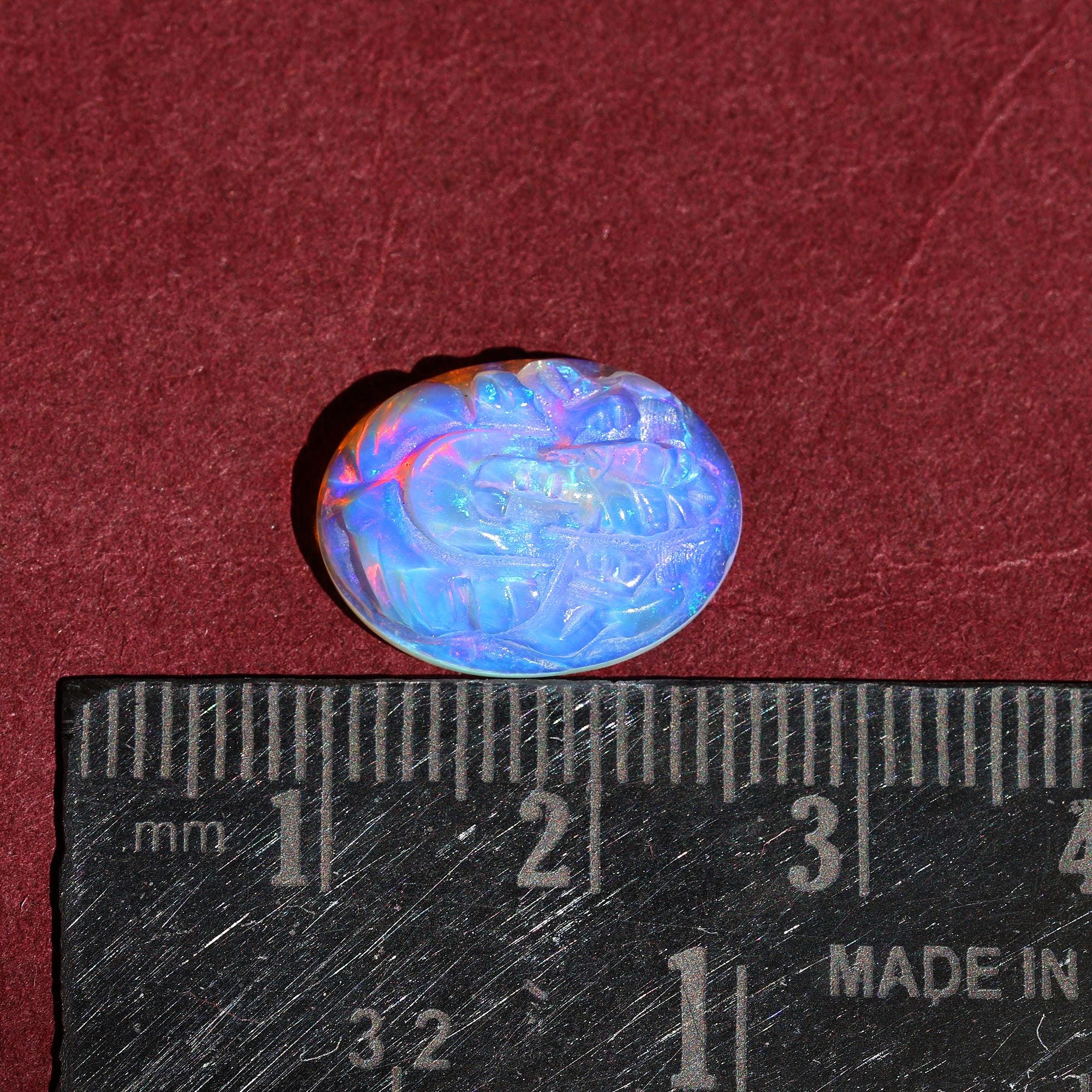 Hand Carved Ethiopian Opal Ganesha: Multi Fire Gemstone Carving (5.10 Carat)