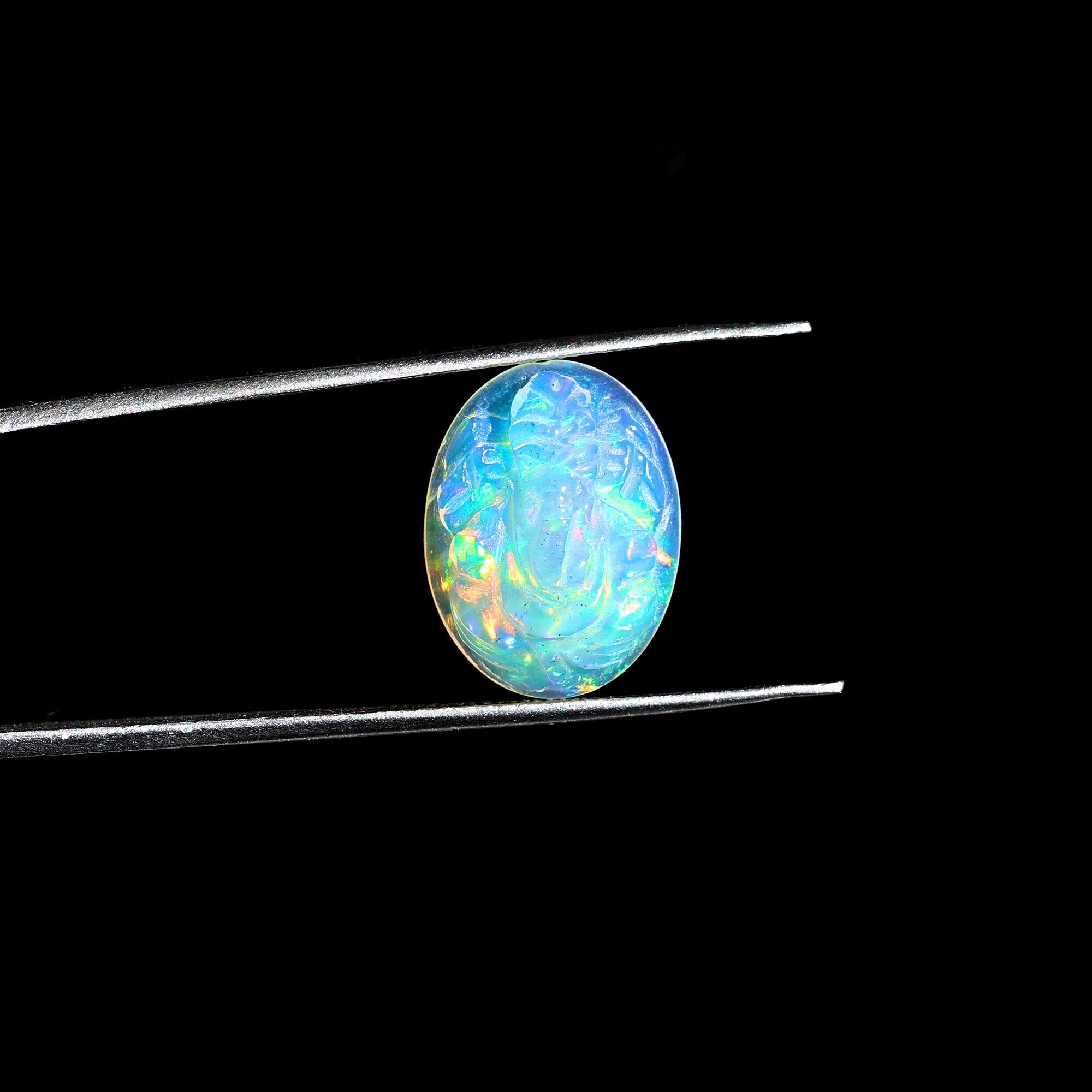 Ethiopian Opal Ganesha Carving: 5.20 Carat Welo Fire Gemstone (12x16mm)