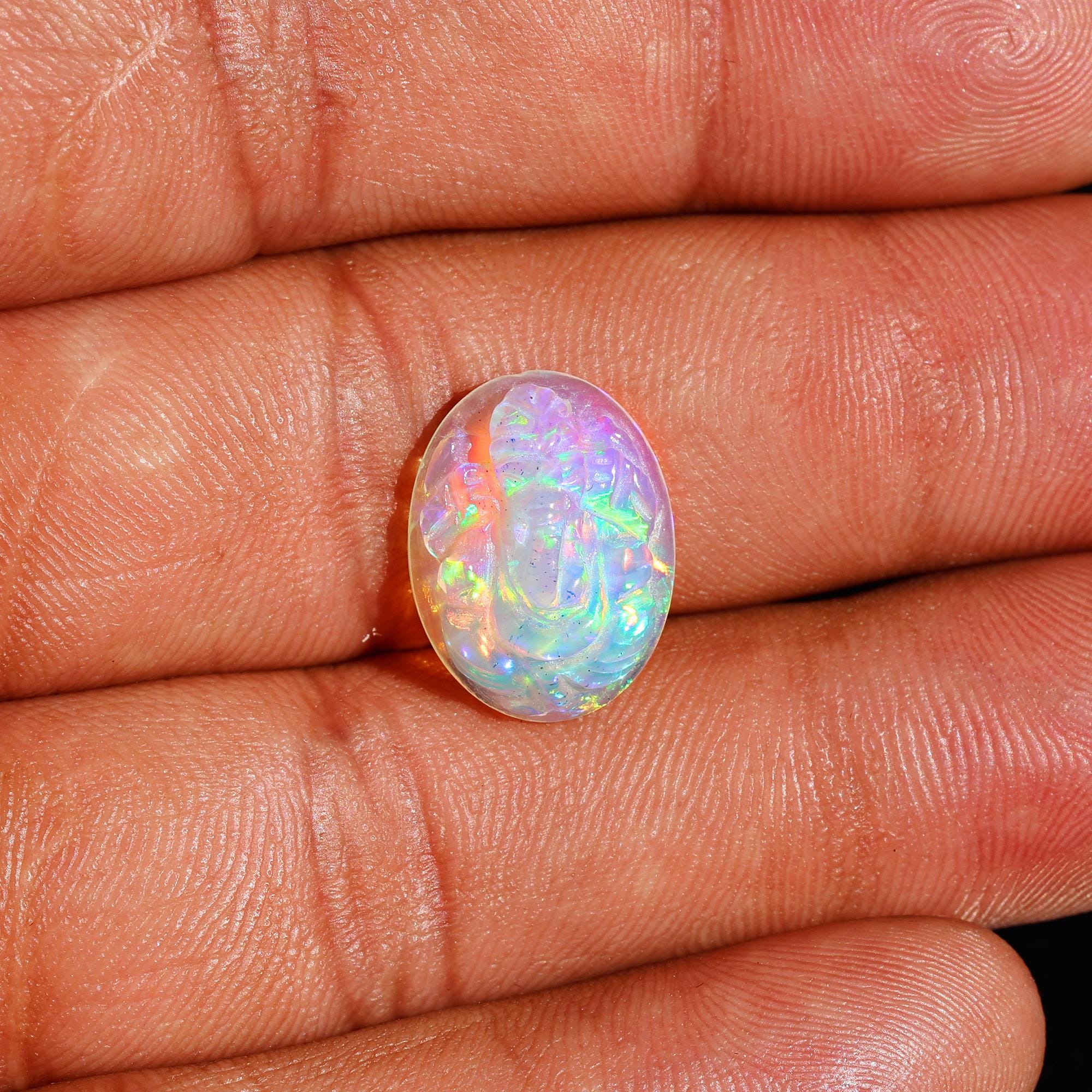 Ethiopian Opal Ganesha Carving: 5.20 Carat Welo Fire Gemstone (12x16mm)