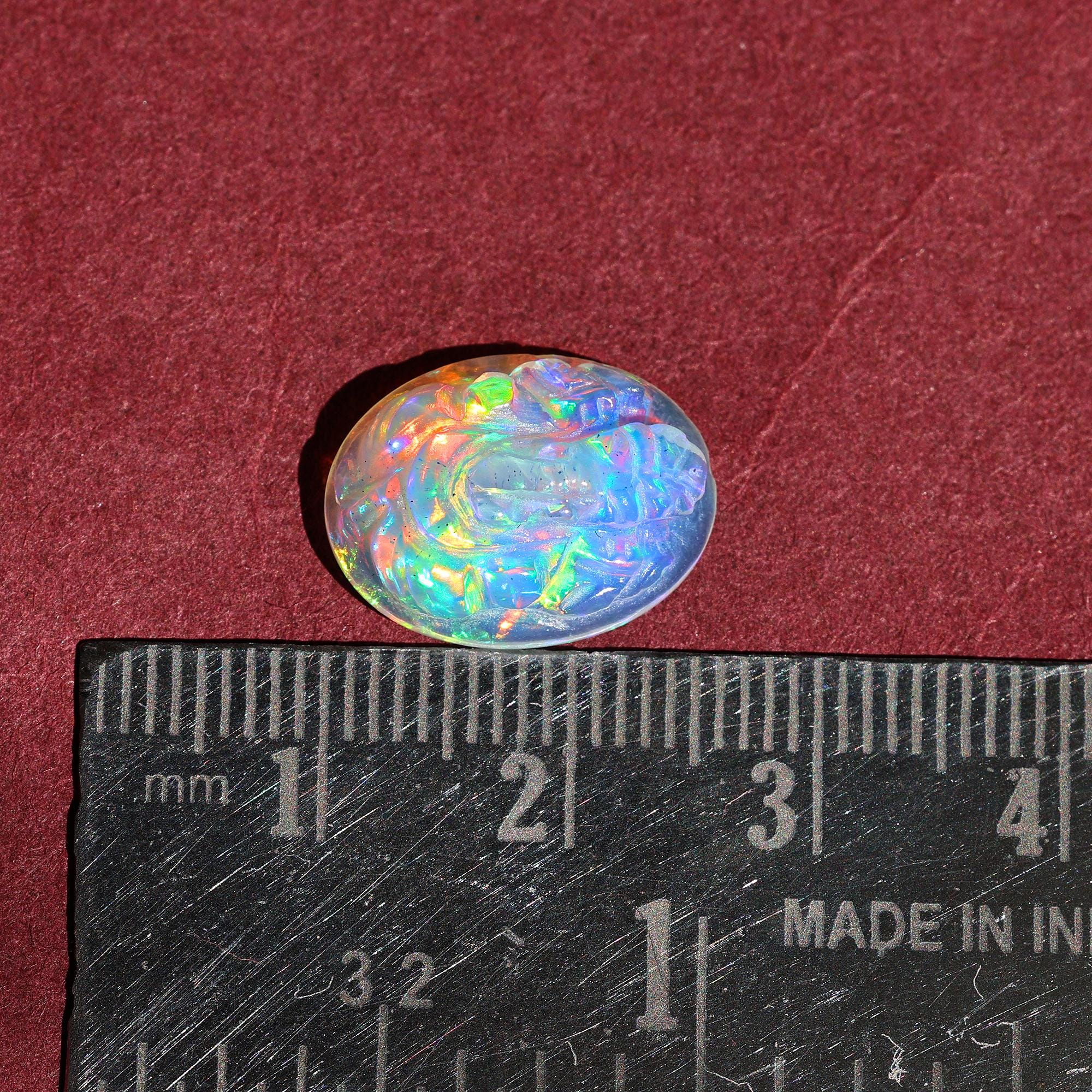 Ethiopian Opal Ganesha Carving: 5.20 Carat Welo Fire Gemstone (12x16mm)
