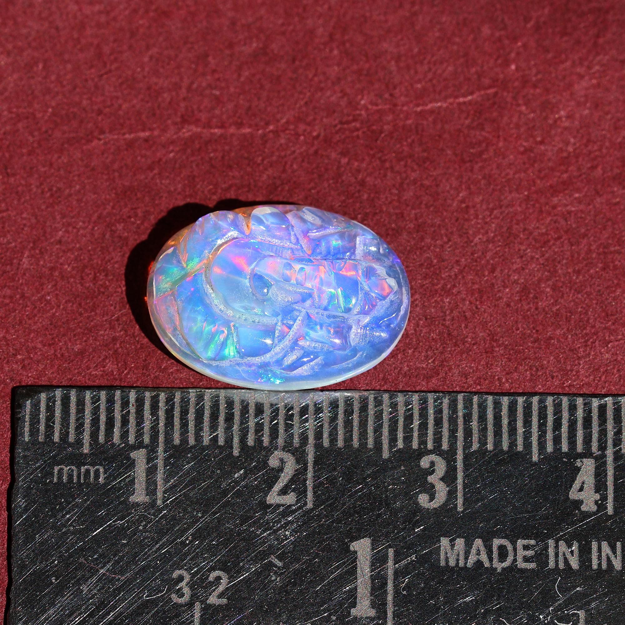 Welo Fire Opal Carving: Ganesha Gemstone Figurine (5.60 Carat)