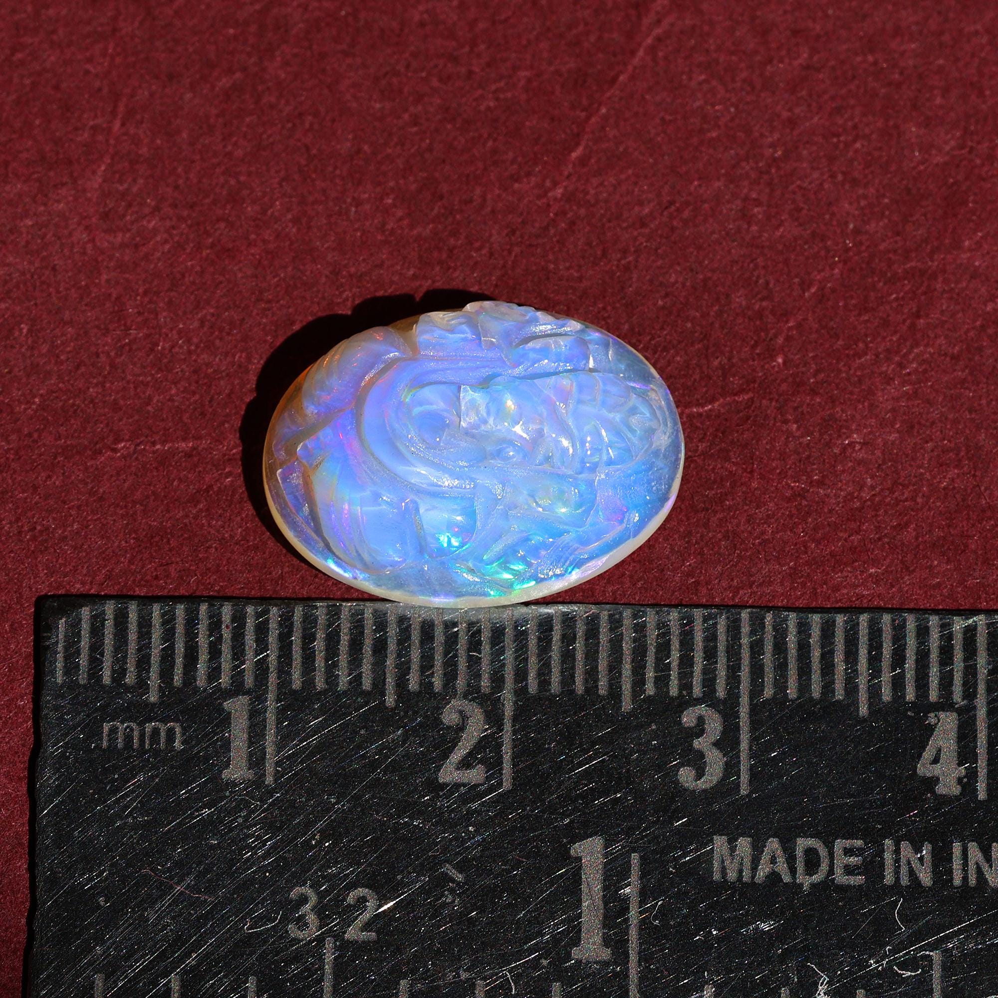 Hand-Carved Opal Ganesha Statue: Ethiopian Gemstone Carving (8.30 Carat)