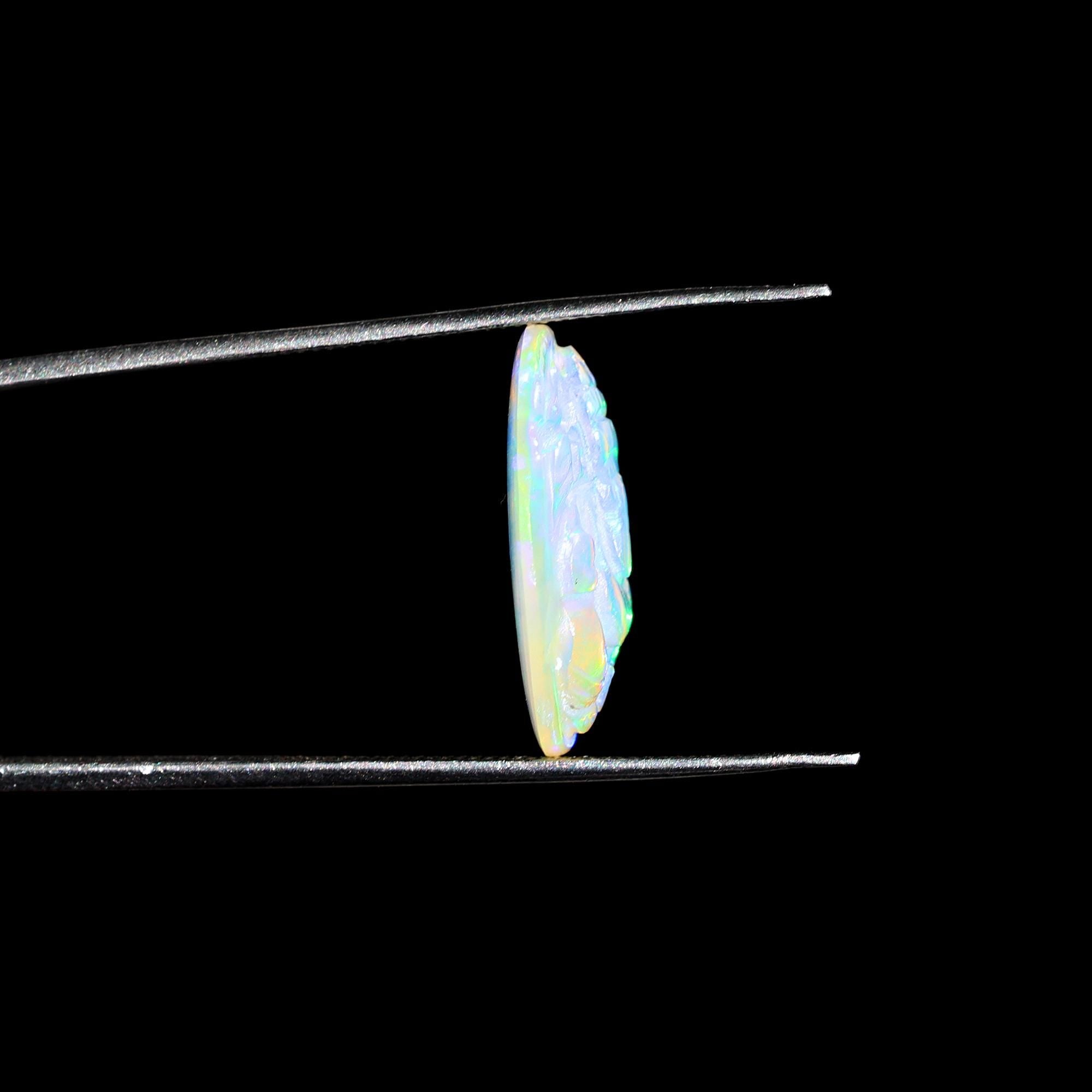 Carved Opal Ganesha Statue: 5.60 Carat Ethiopian Gemstone Carving