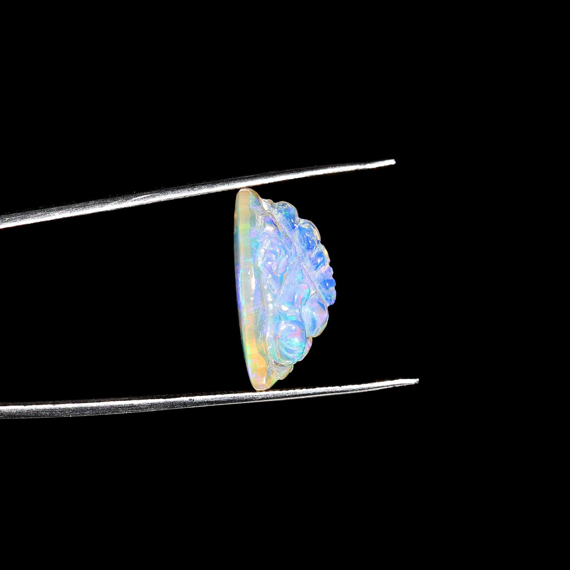 8.60 Carat Carved White Ethiopian Opal Ganesha Figurine