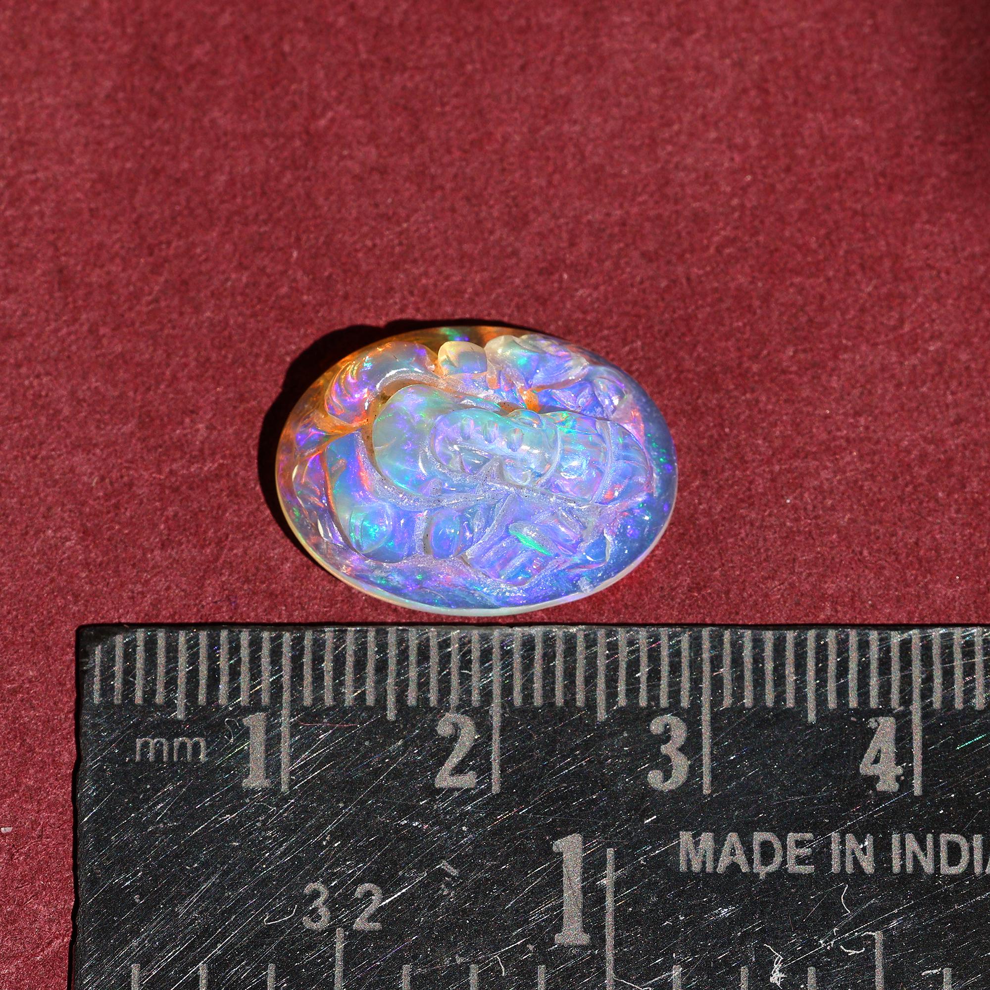 8.60 Carat Carved White Ethiopian Opal Ganesha Figurine