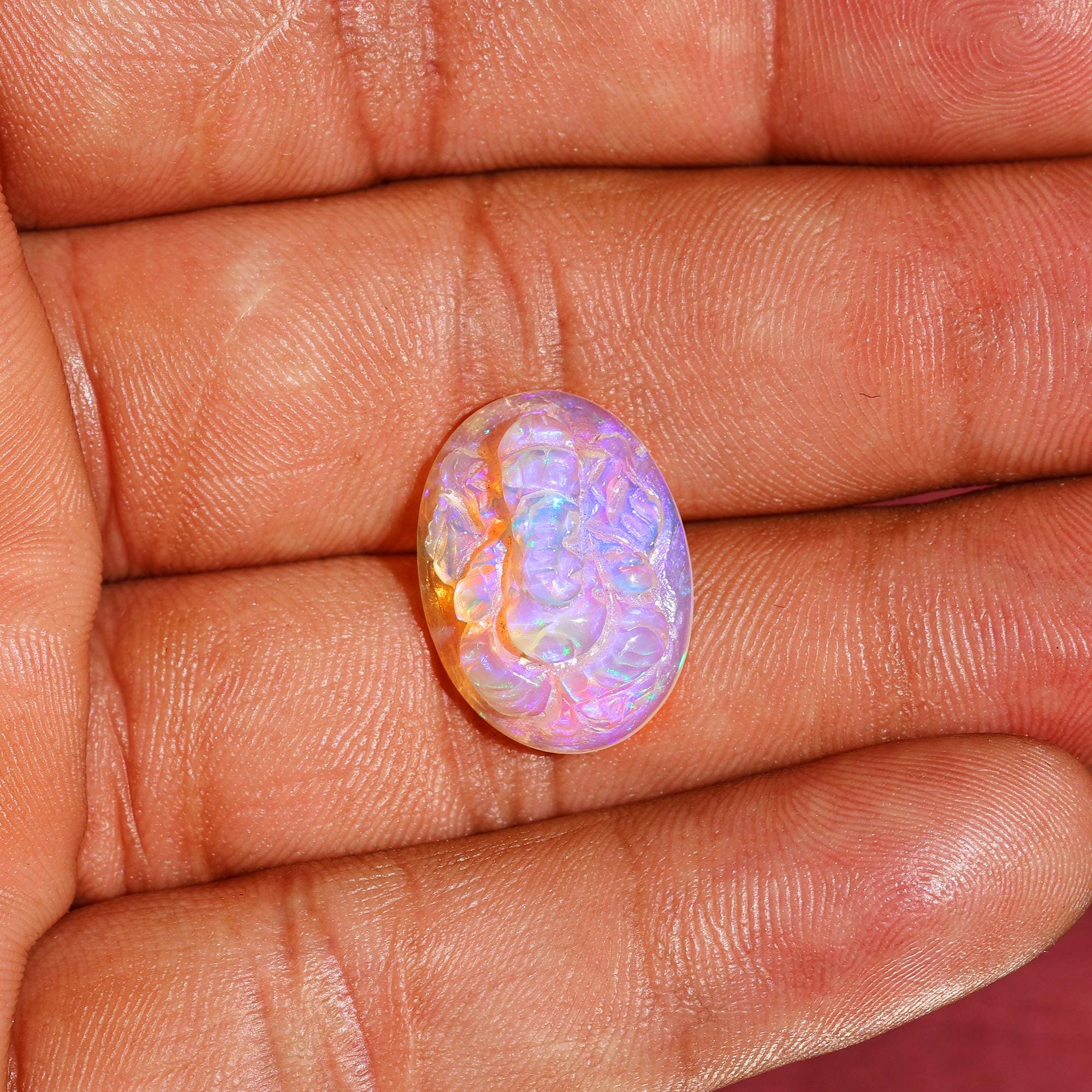 8.60 Carat Carved White Ethiopian Opal Ganesha Figurine