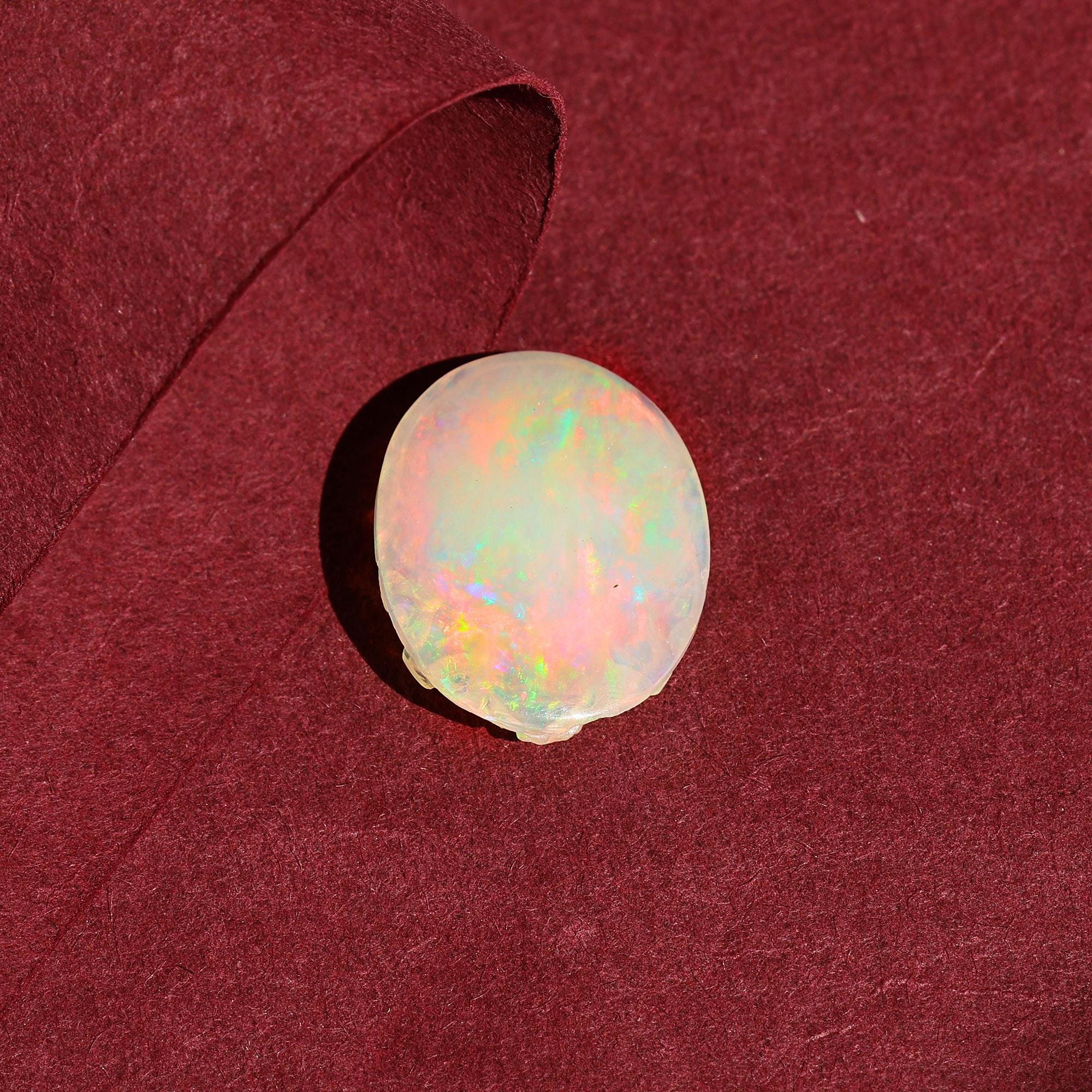 Hand-Carved Ethiopian Opal Ganesha Statue: Spiritual Home Decor (15x19mm, 7.50 Carat)