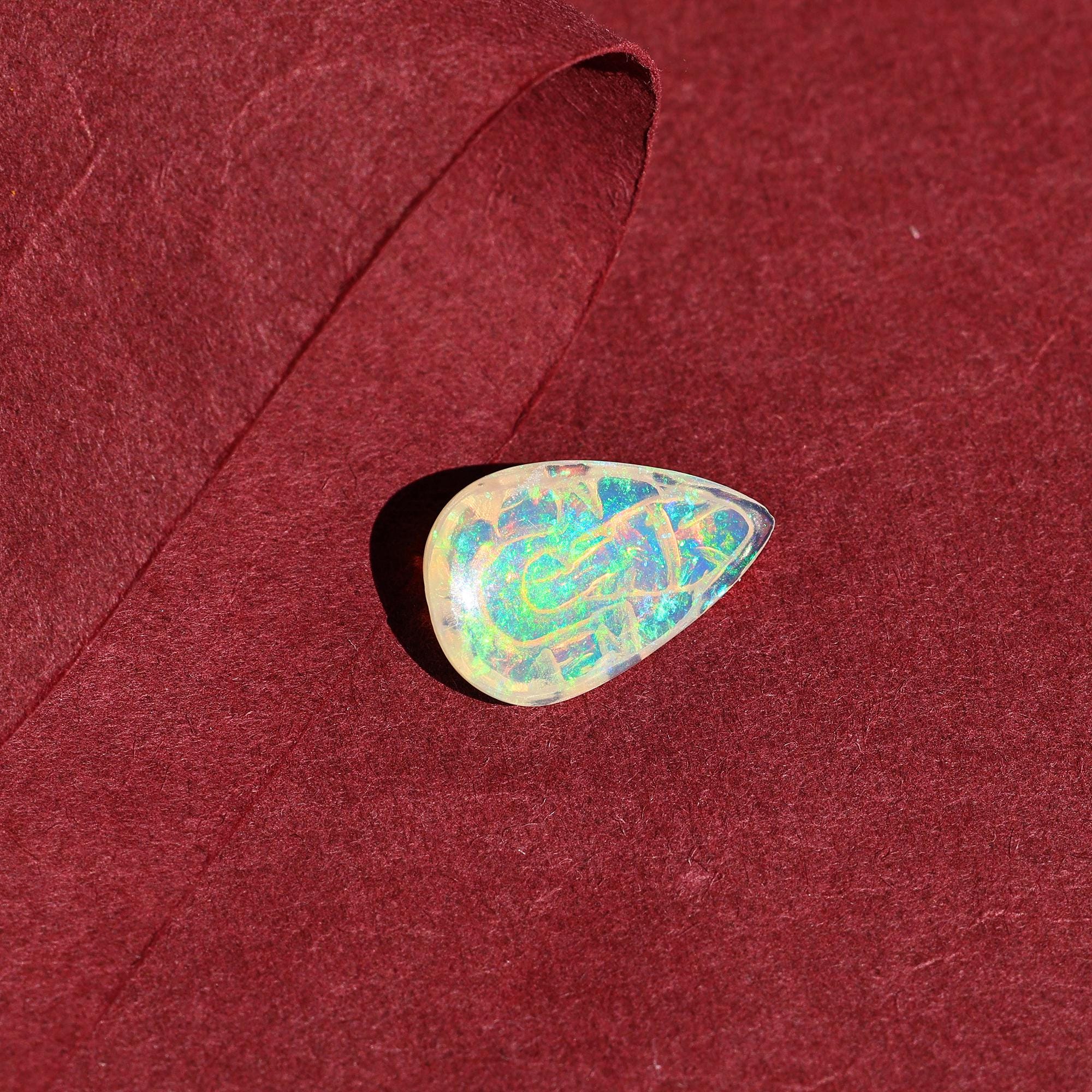 Ethiopian Opal Ganesha Carving: Pear Gemstone (11x18mm)