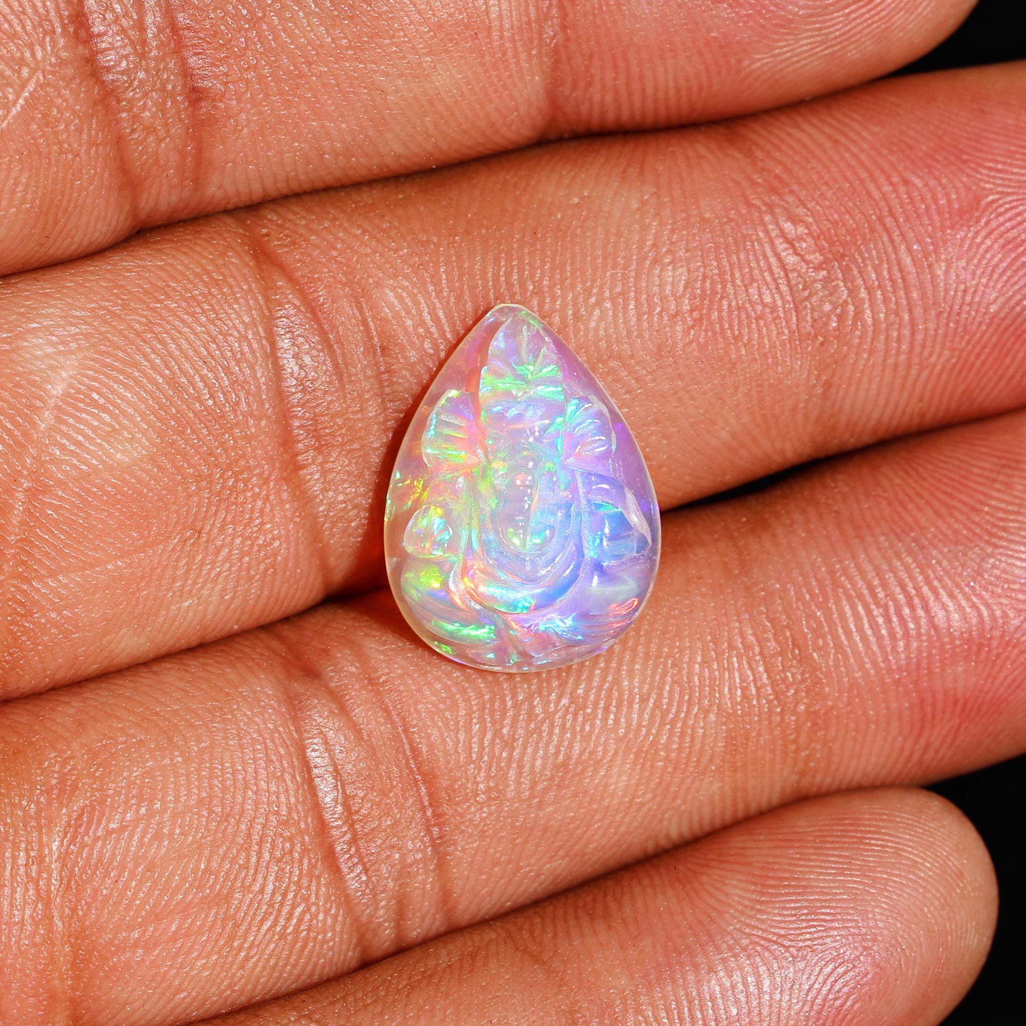 Hand-Carved Ethiopian Opal Ganesha Statue: Pear Shape Crystal Carving (5.60 Carat)