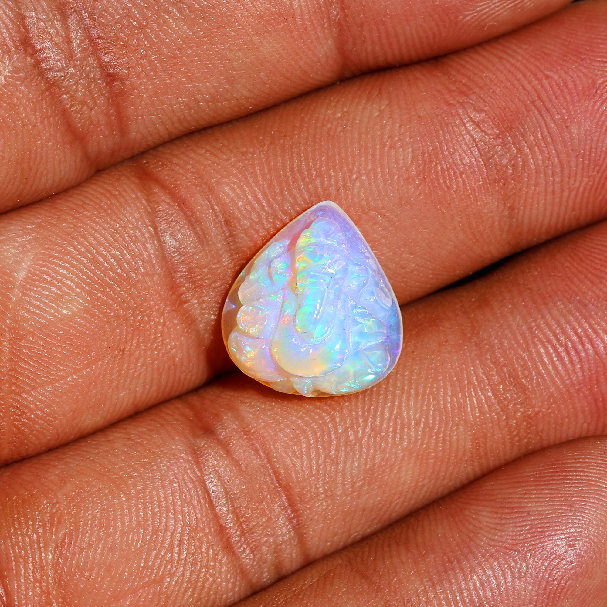 Ethiopian Opal Ganesha Idol: Heart Carving, Spiritual Hindu Figurine