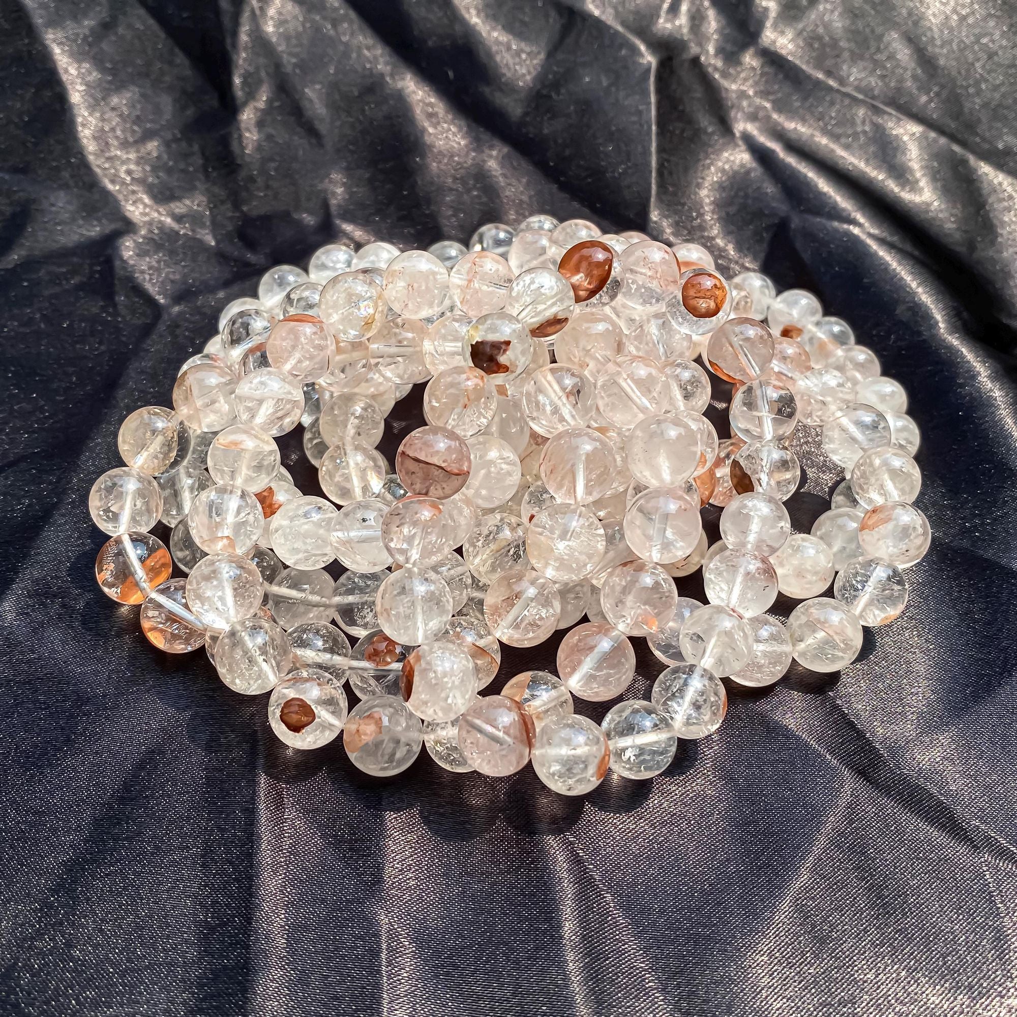 Himalaya Quartz Himalayan Pink Quartz Crystal Bracelet with natural gemstone beads on a stretch jewelry design.