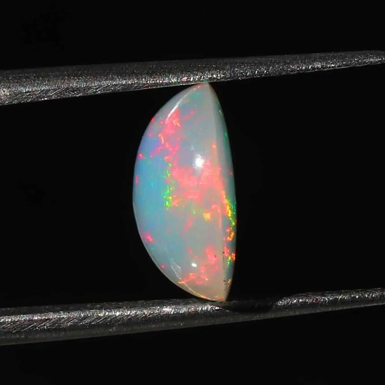 Ethiopian Opal Gemstone: 2.5 Ct Oval Cabochon Multi-Color Fire Play loose gemstones