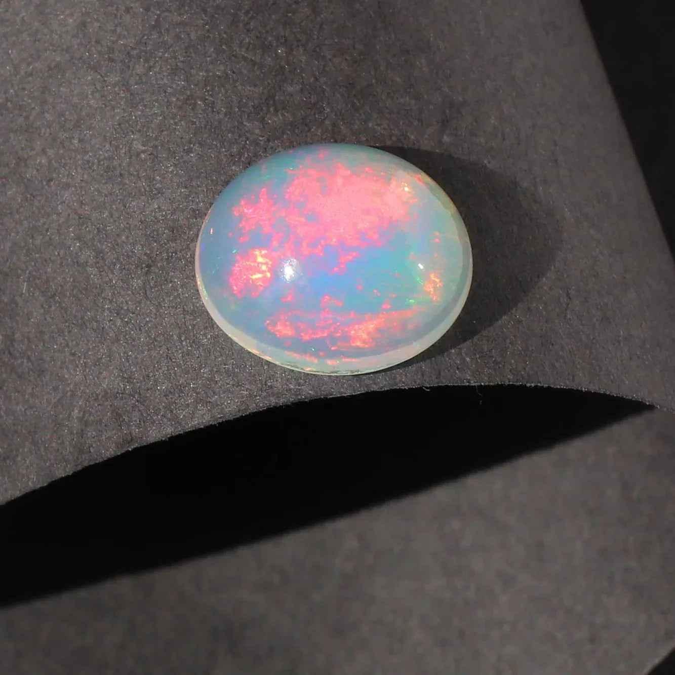 Ethiopian Opal Gemstone: 2.5 Ct Oval Cabochon Multi-Color Fire Play loose gemstones