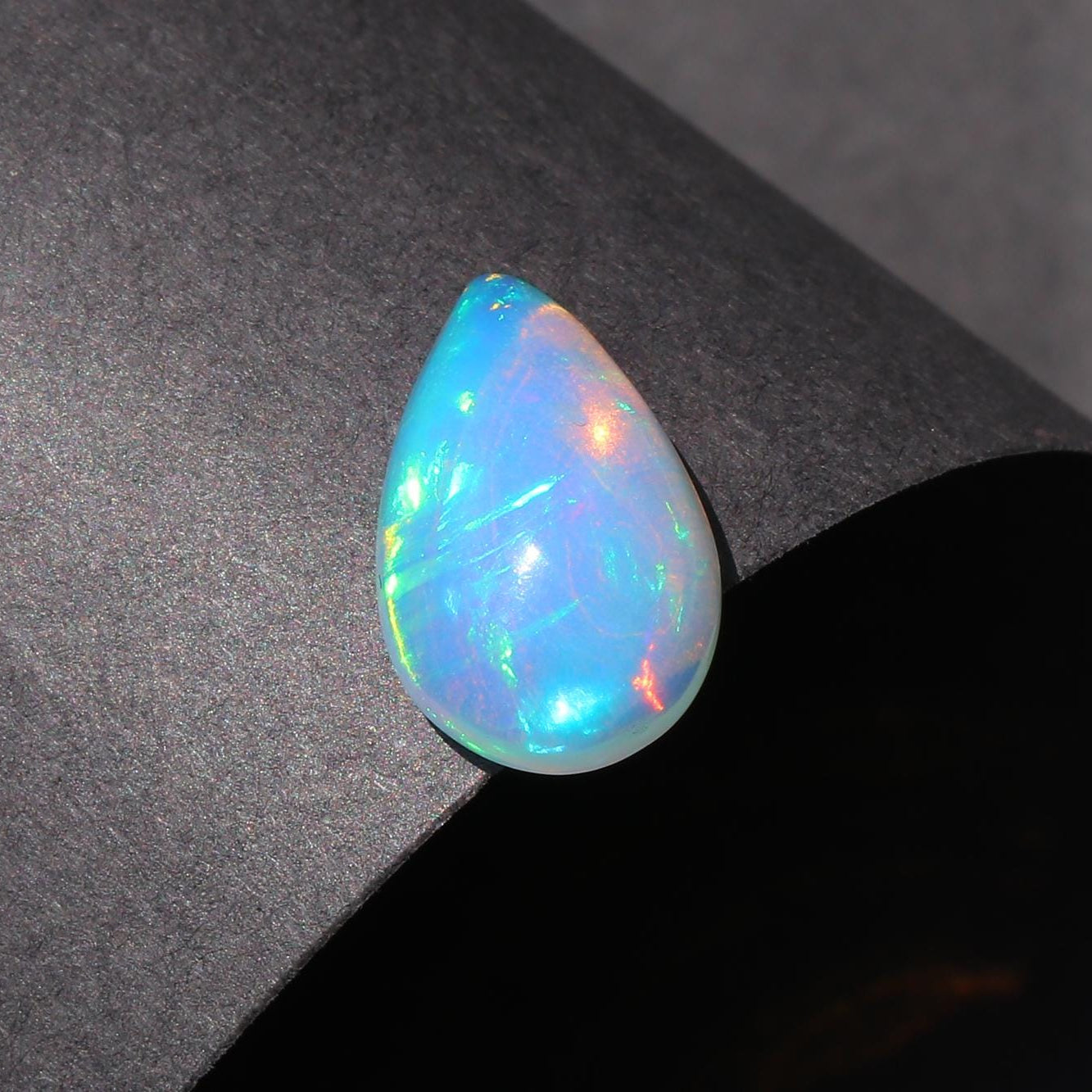 Welo Opal Cabochon: 2.88 Carat Pear Shape Ethiopian Gemstone