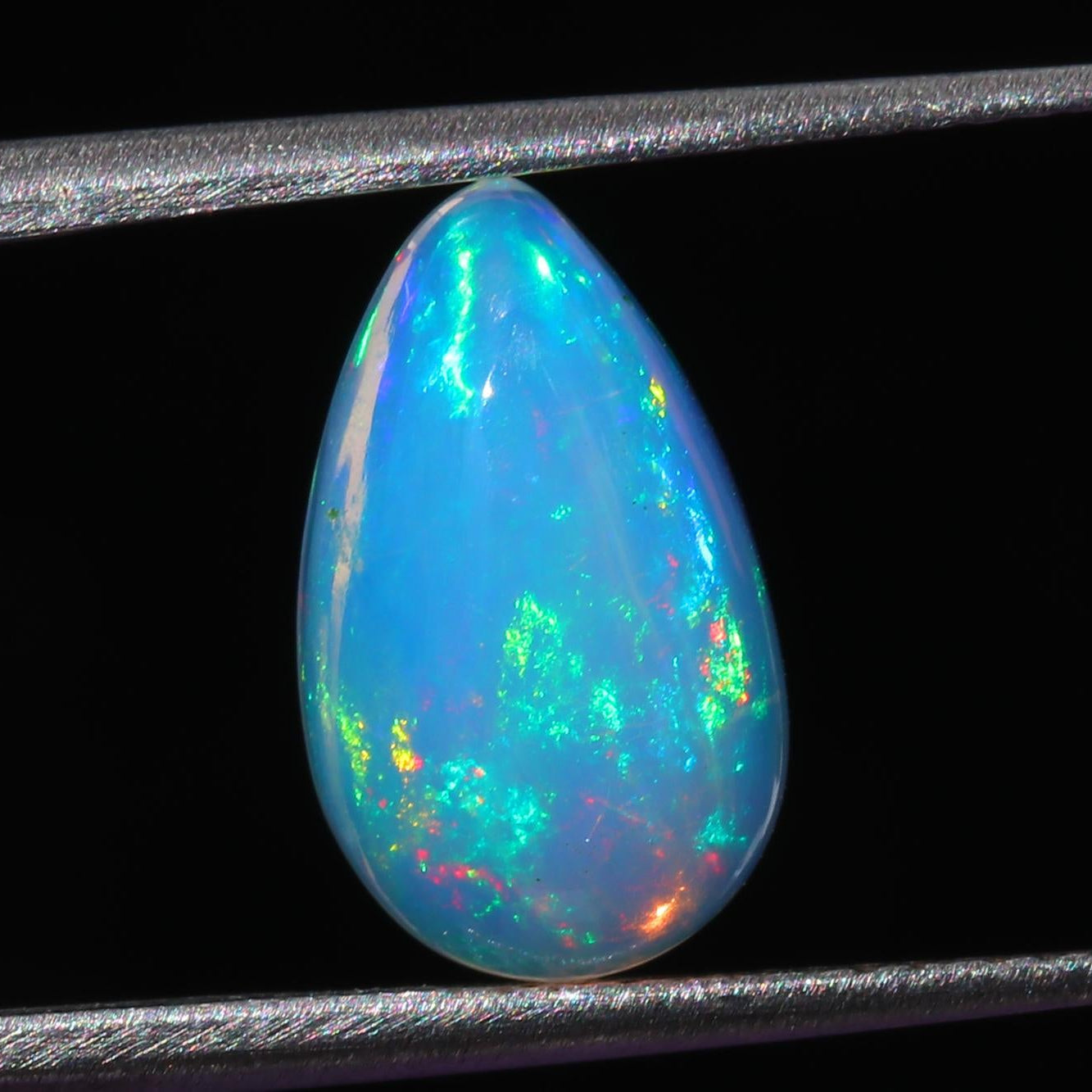 Welo Opal Cabochon: Pear Shape Ethiopian Gemstone, 2.84 cts