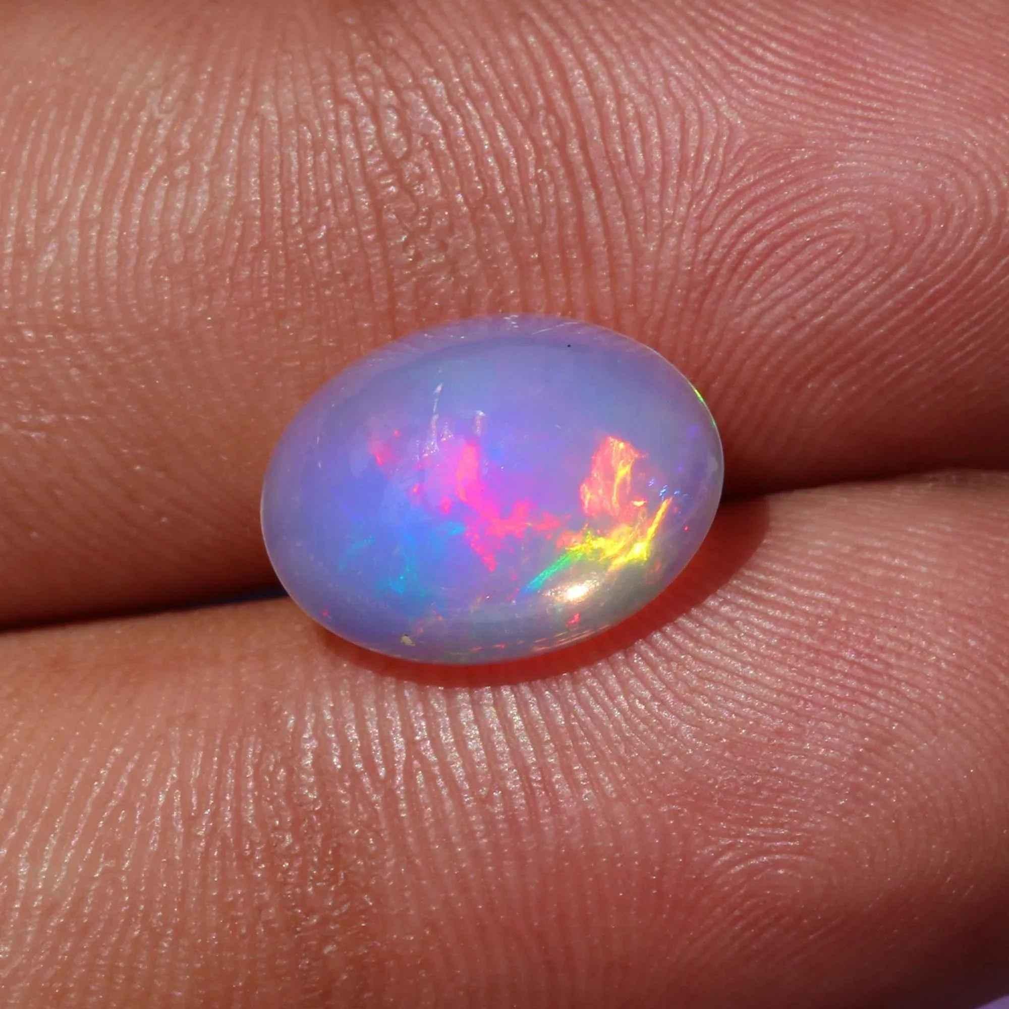 Ethiopian Opal Cabochon: 2.96ct Rainbow Fire Gemstone, 10x14mm loose gemstones