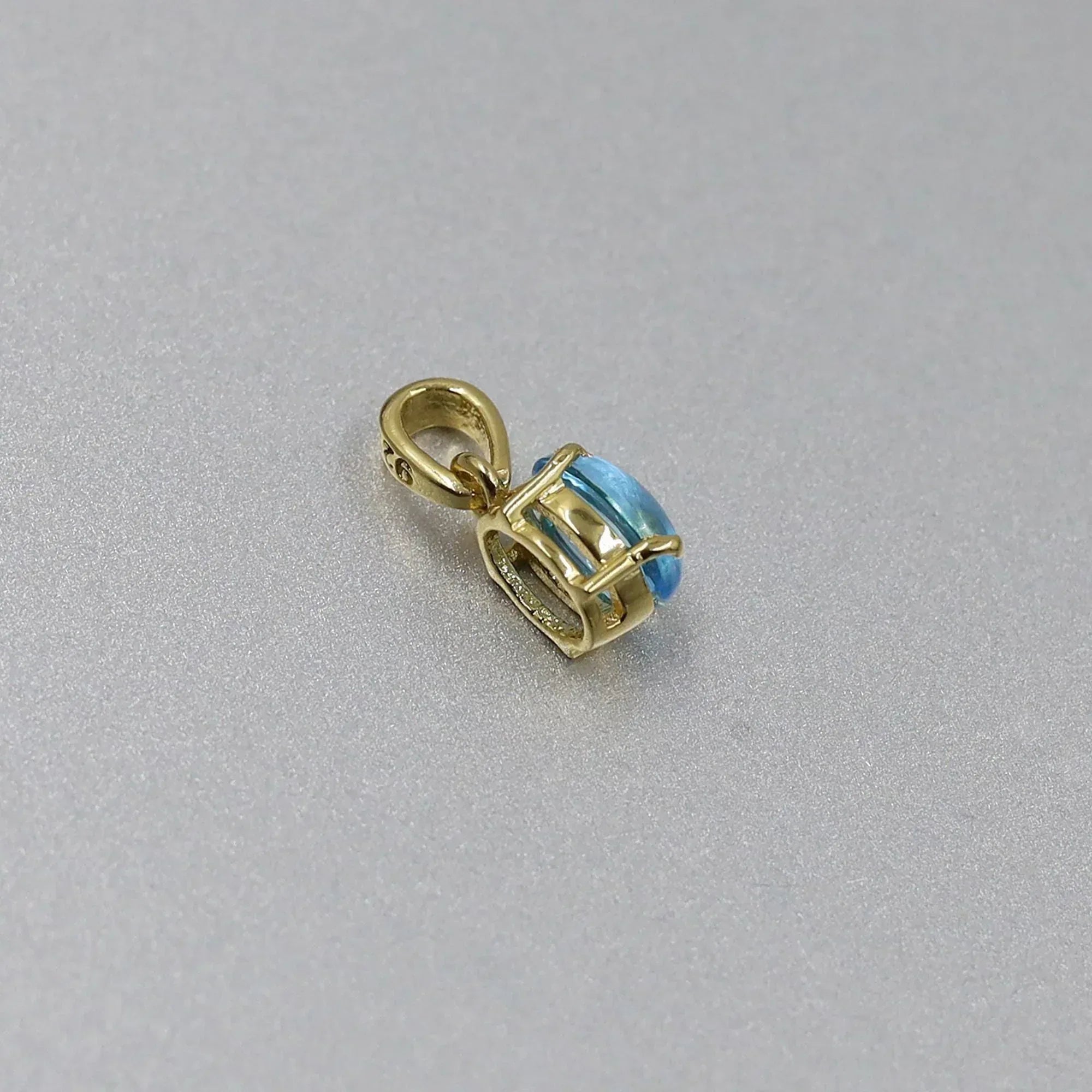 Swiss Blue Topaz Pendant: Oval Sterling Silver December Birthstone